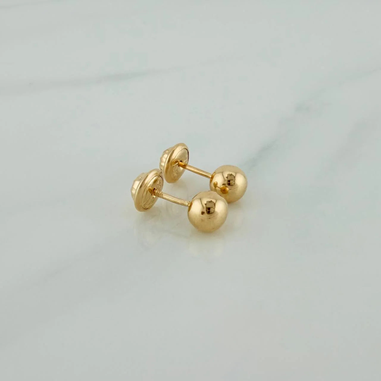 Topos Bola Lisa 0.6 g / in / 5 mm Oro Amarillo 18K