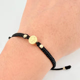 Pulsera Negra San Benito 3mm-4mm 4 Und Bolas Diamantadas Oro Amarillo 18K (A.C)