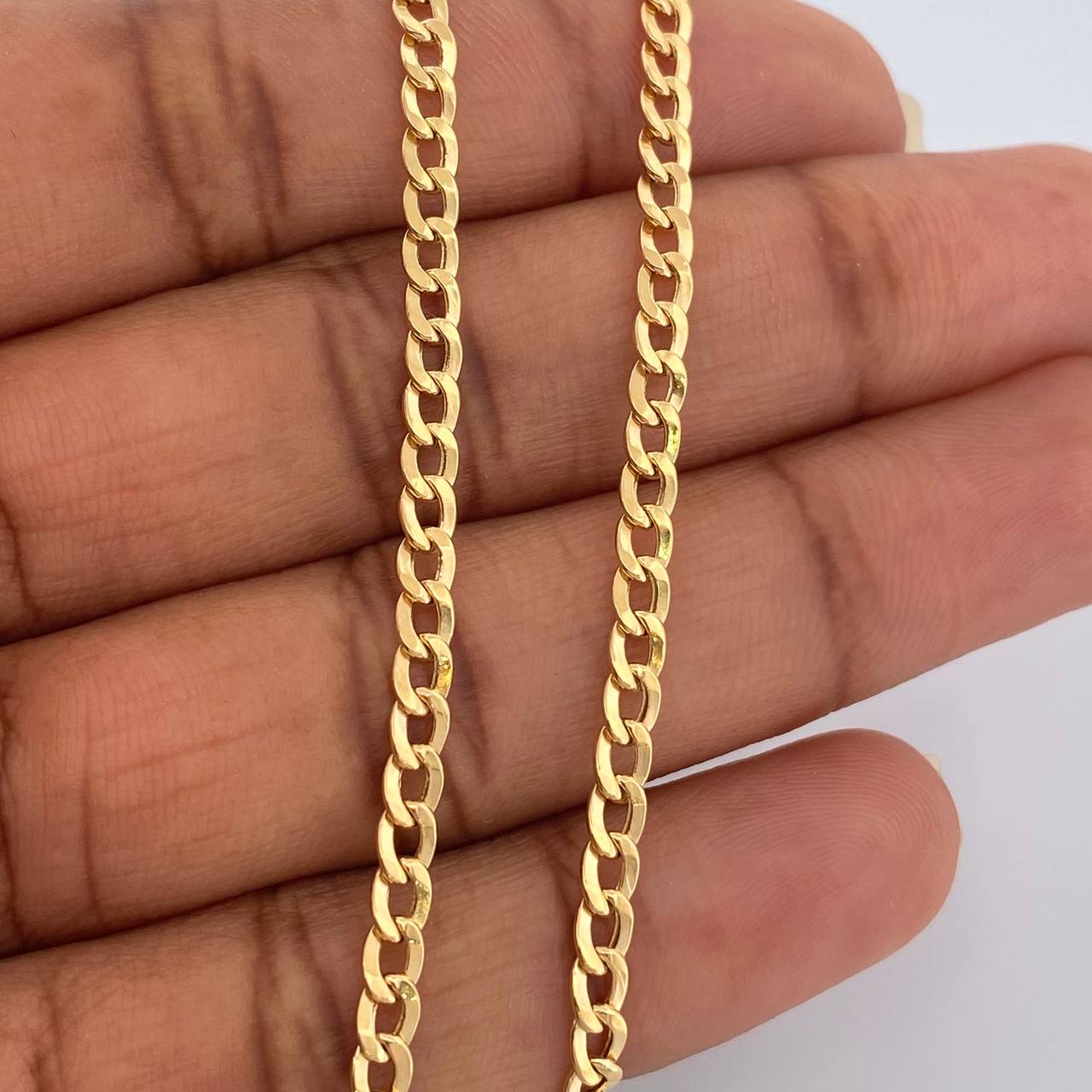 Cadena Cubana 4.8gr / 23 3/4 in / 3mm Oro Amarillo +1 18K $