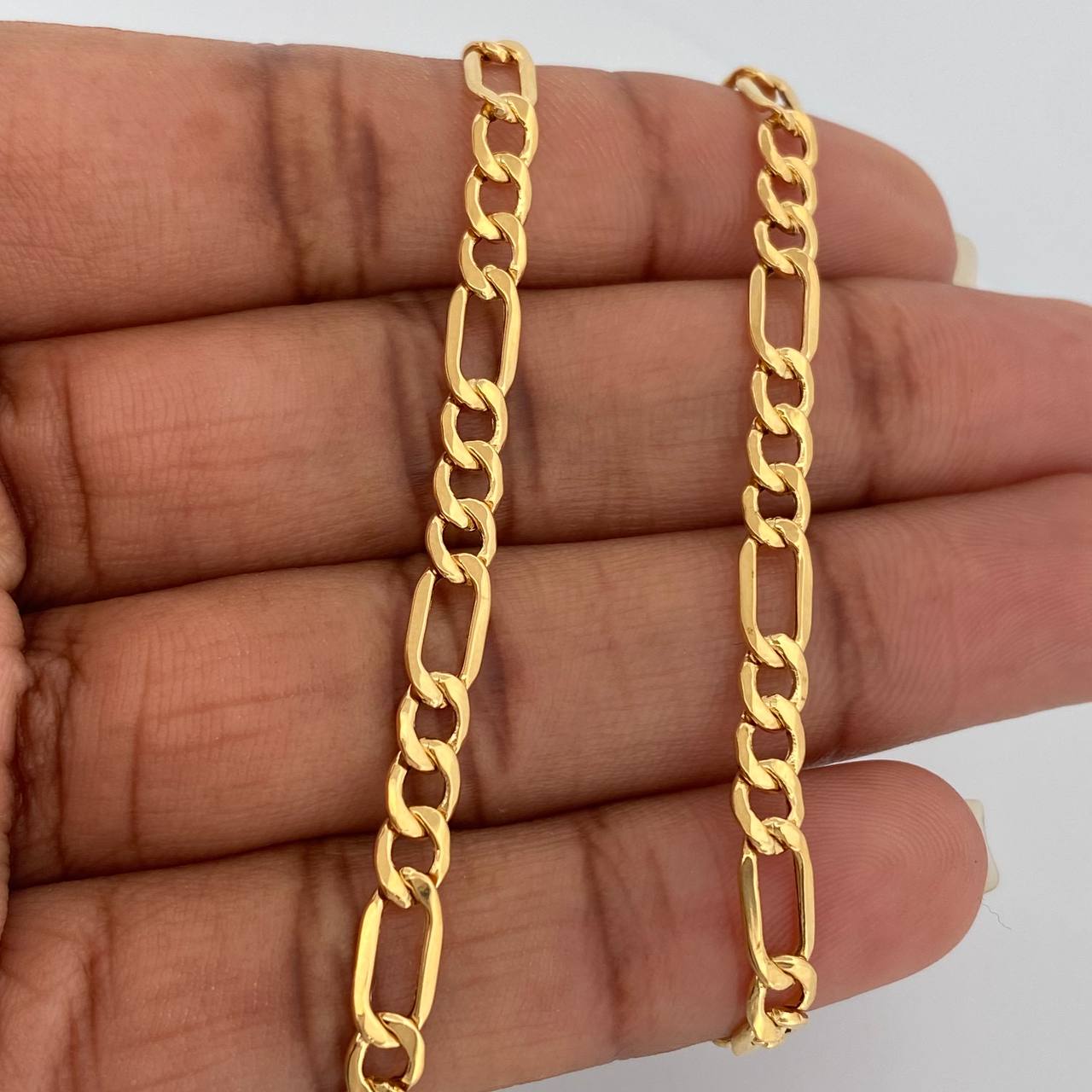 Cadena Figaro 9.15gr / 23 3/4 in / 4.2mm Oro Amarillo +1 18K $