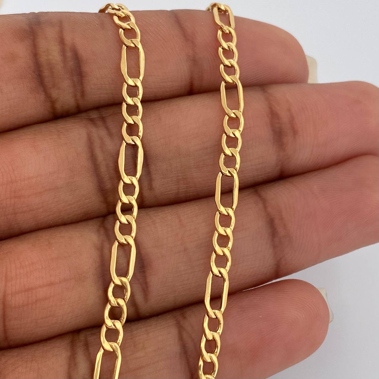 Cadena Figaro 5.3gr / 23 3/4 in / 3.28mm Oro Amarillo +1 18K $