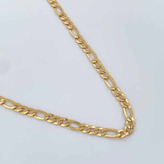 Cadena Figaro 7.45gr / 28 in / 3.2mm Oro Amarillo +1 18K $