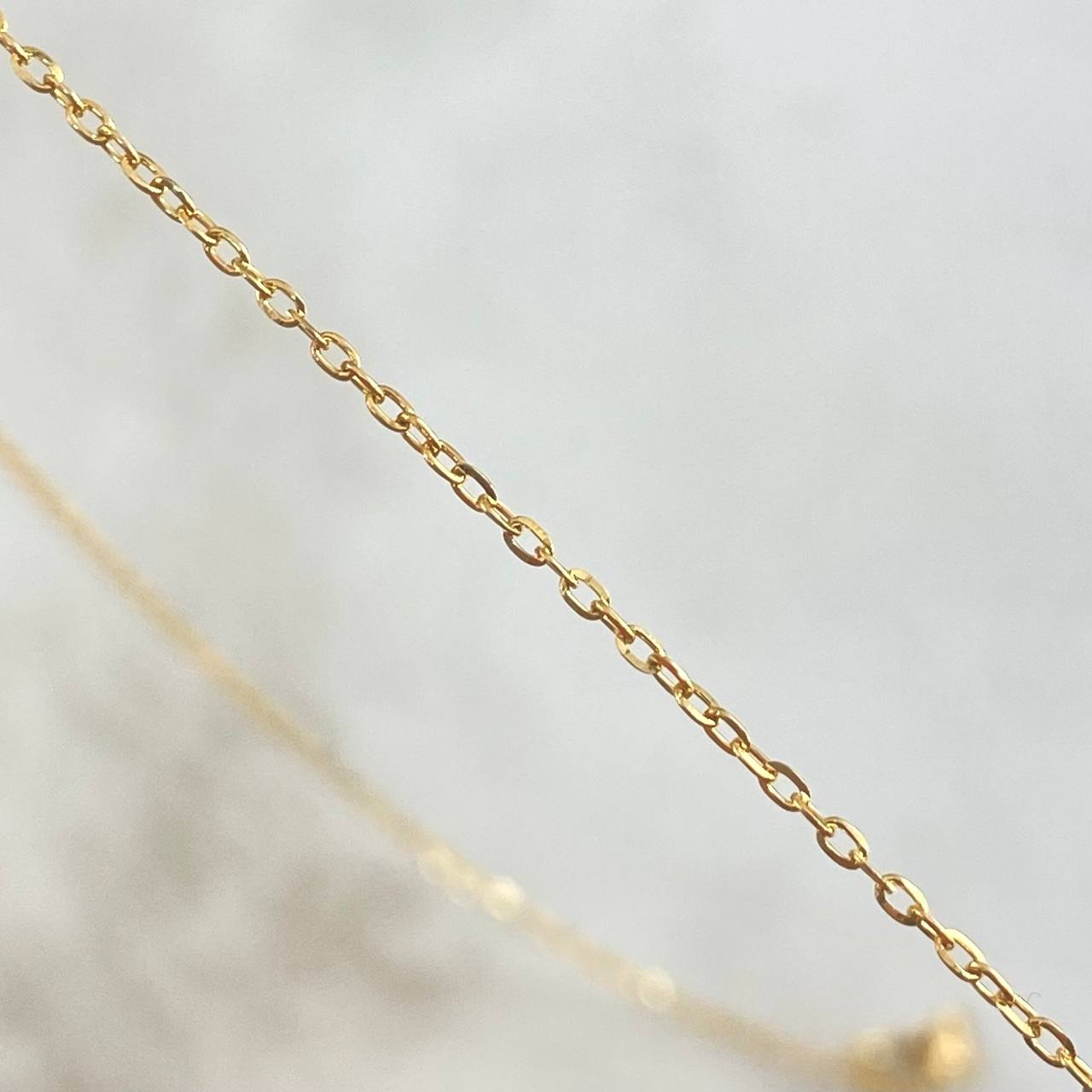 Cadena Aro Seguido 1.5gr / 45cm / 1mm + Dije Estrella Tambor 0.6gr / 0.7cm  Oro Amarillo (Oferta)