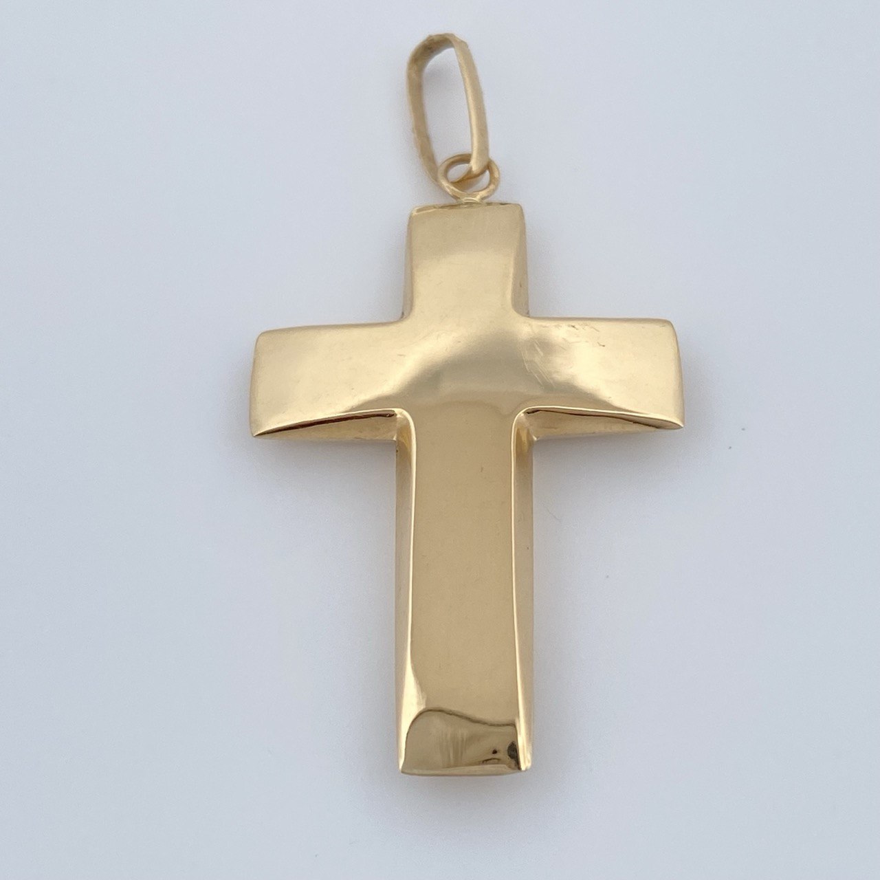 Dije Cruz 1.95gr / 1 1/2 in / Oro Amarillo 18K $