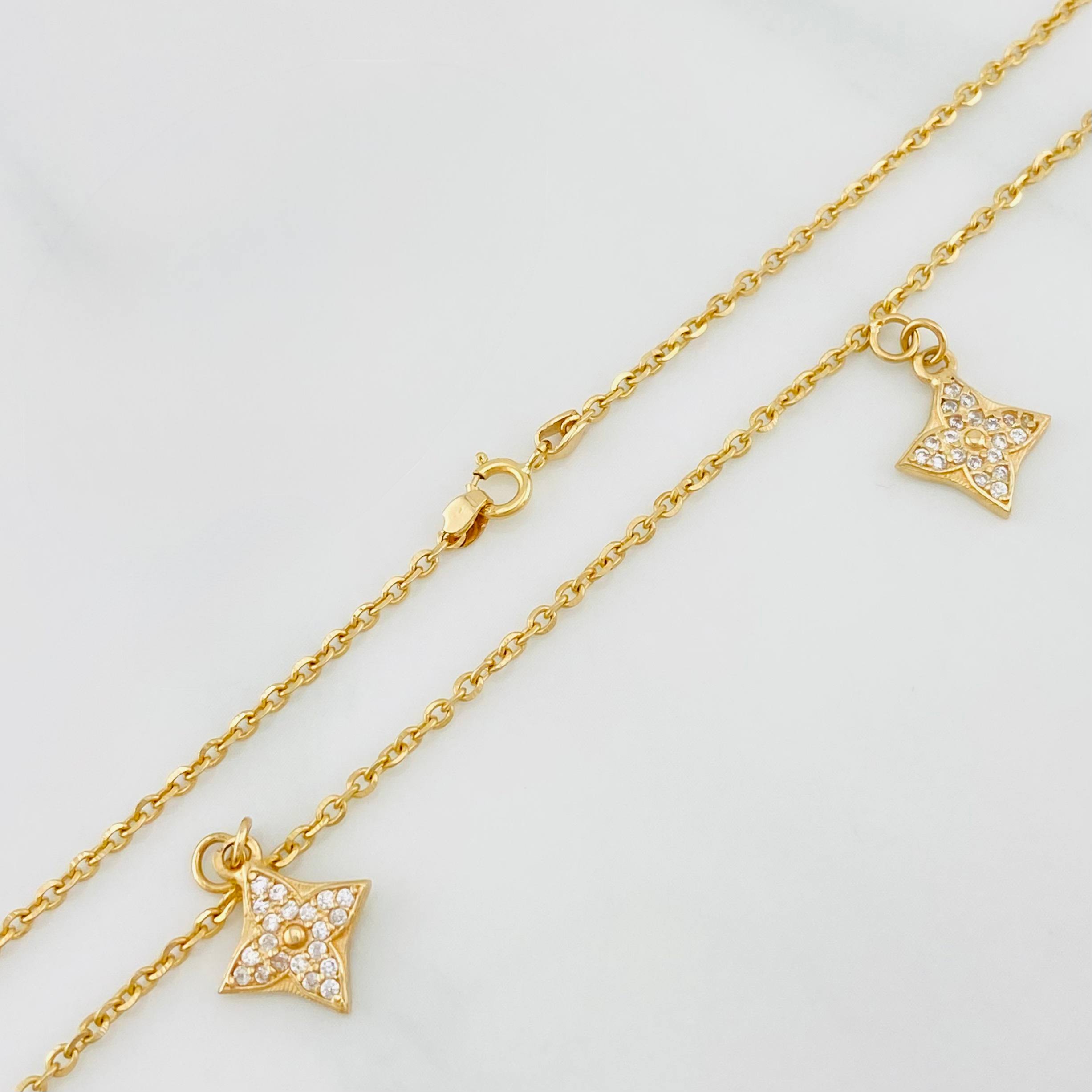 Cadena Aro Seguido Flor 4.7 g / 16 in / 1.53 mm Oro Amarillo 18K