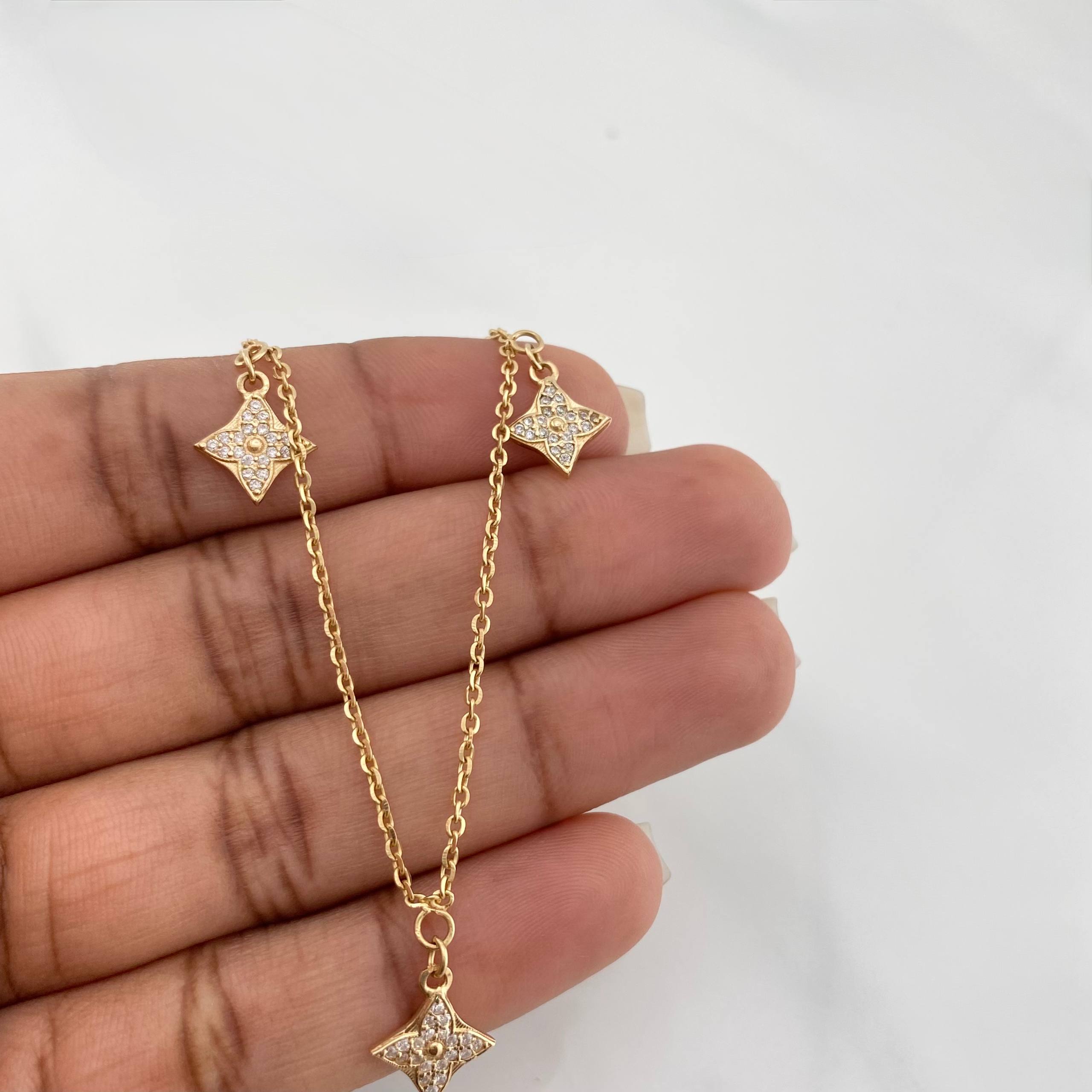 Cadena Aro Seguido Flor 4.7 g / 16 in / 1.53 mm Oro Amarillo 18K