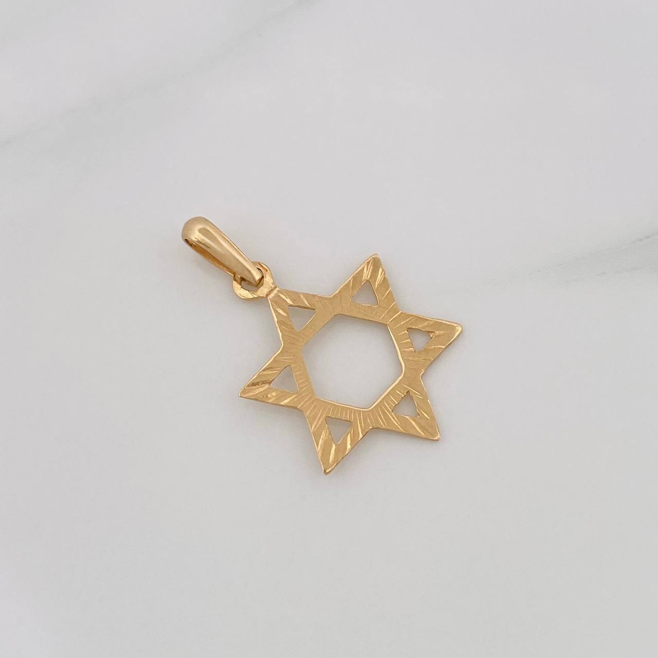 Dije Silueta Estrella 0.7g / 1 1/2 in Oro Amarillo 18K