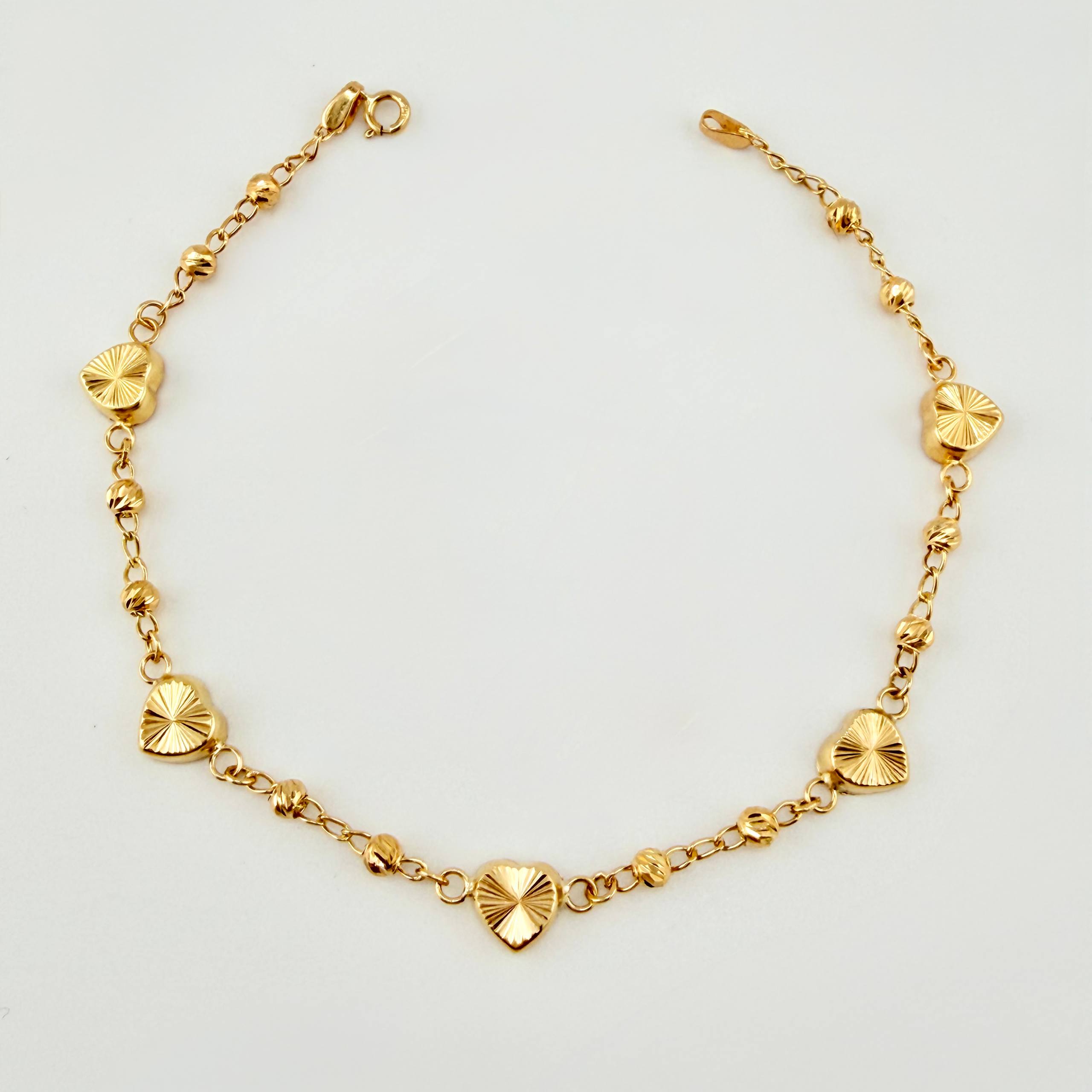 Pulso Corazones Rayados Tipo Militar 3.1gr / 7 1/4 in / 6.4mm Oro Amarillo Nac.Esp. 18K ©