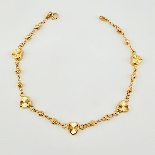 Pulso Corazones Rayados Tipo Militar 3.1gr / 7 1/4 in / 6.4mm Oro Amarillo Nac.Esp. 18K