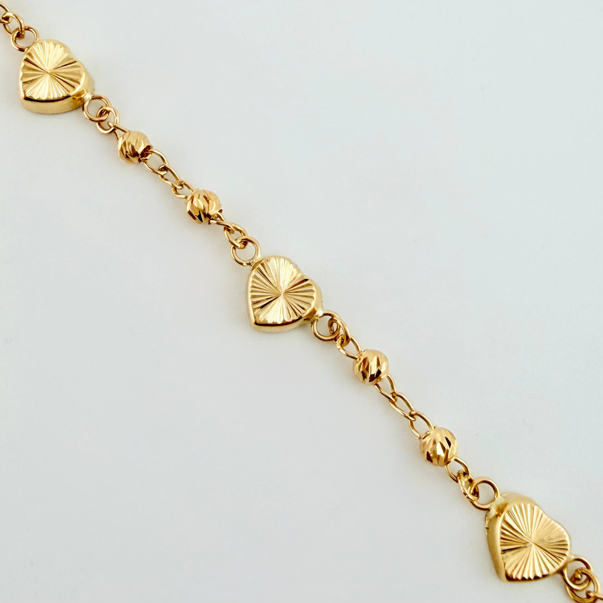 Pulso Corazones Rayados Tipo Militar 3.1gr / 7 1/4 in / 6.4mm Oro Amarillo Nac.Esp. 18K ©