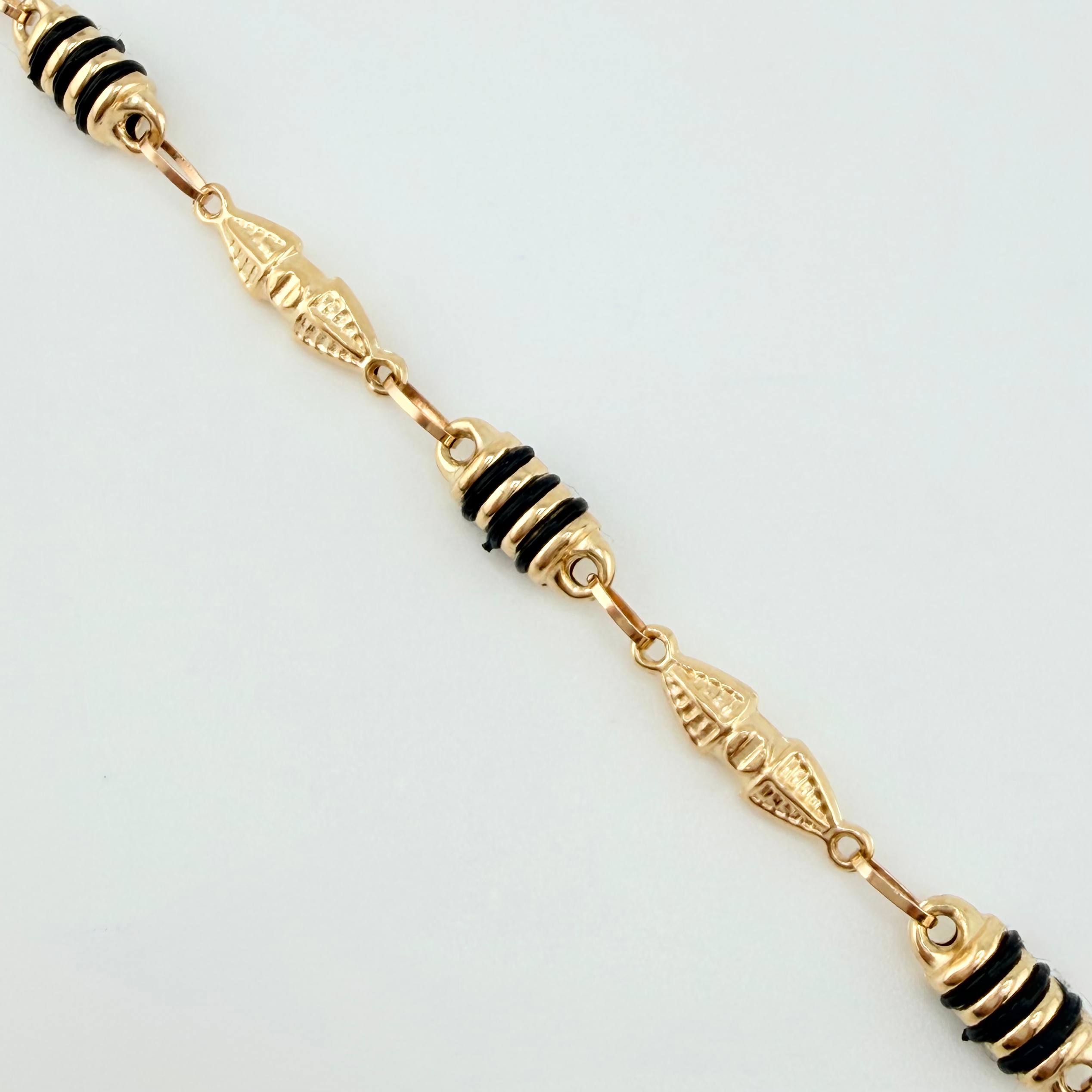 Pulso Rustico Dubai Barril Cauchos Negros 4.1gr / 7 3/4 in / 5mm Oro Amarillo 18K ©