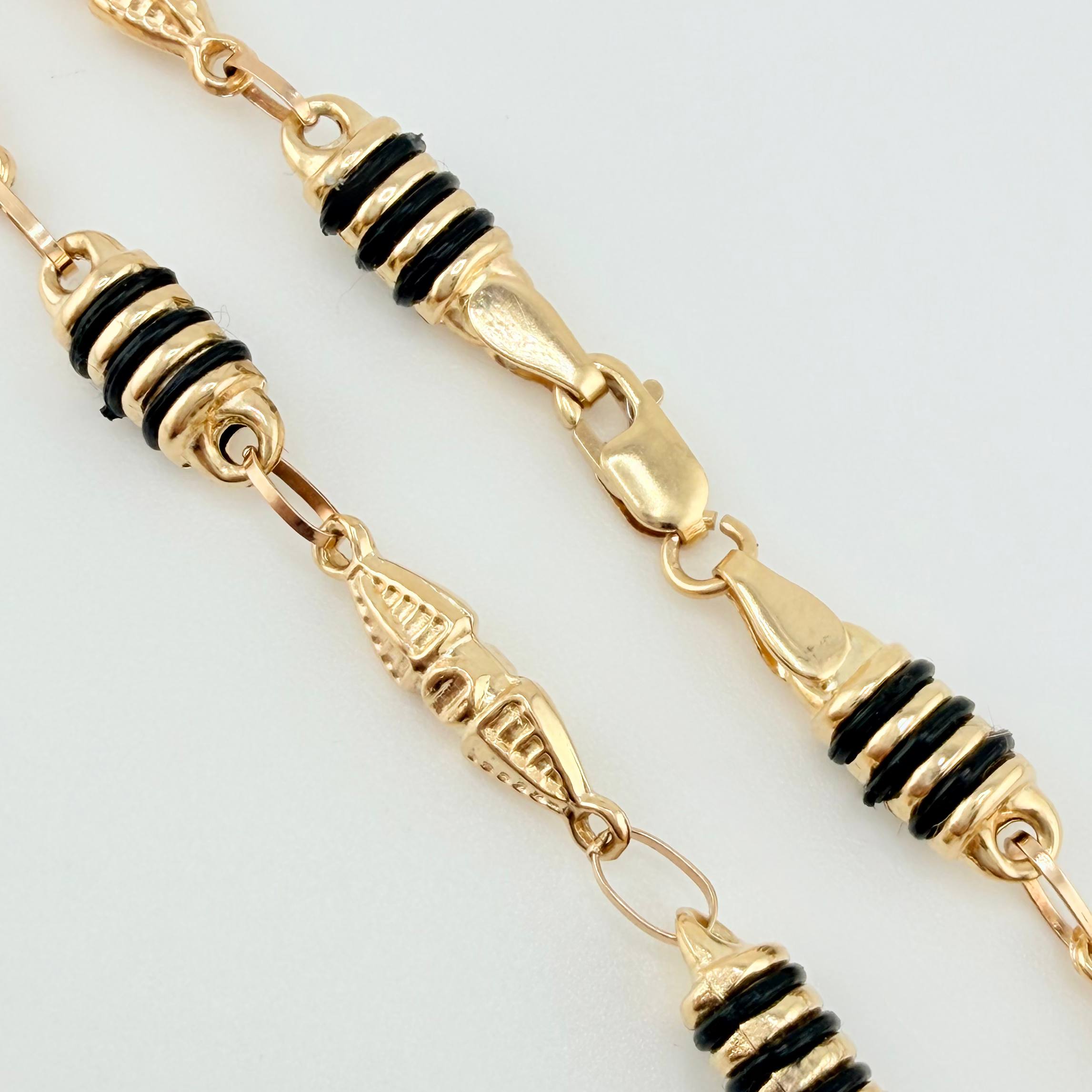 Pulso Rustico Dubai Barril Cauchos Negros 4.1gr / 7 3/4 in / 5mm Oro Amarillo 18K ©