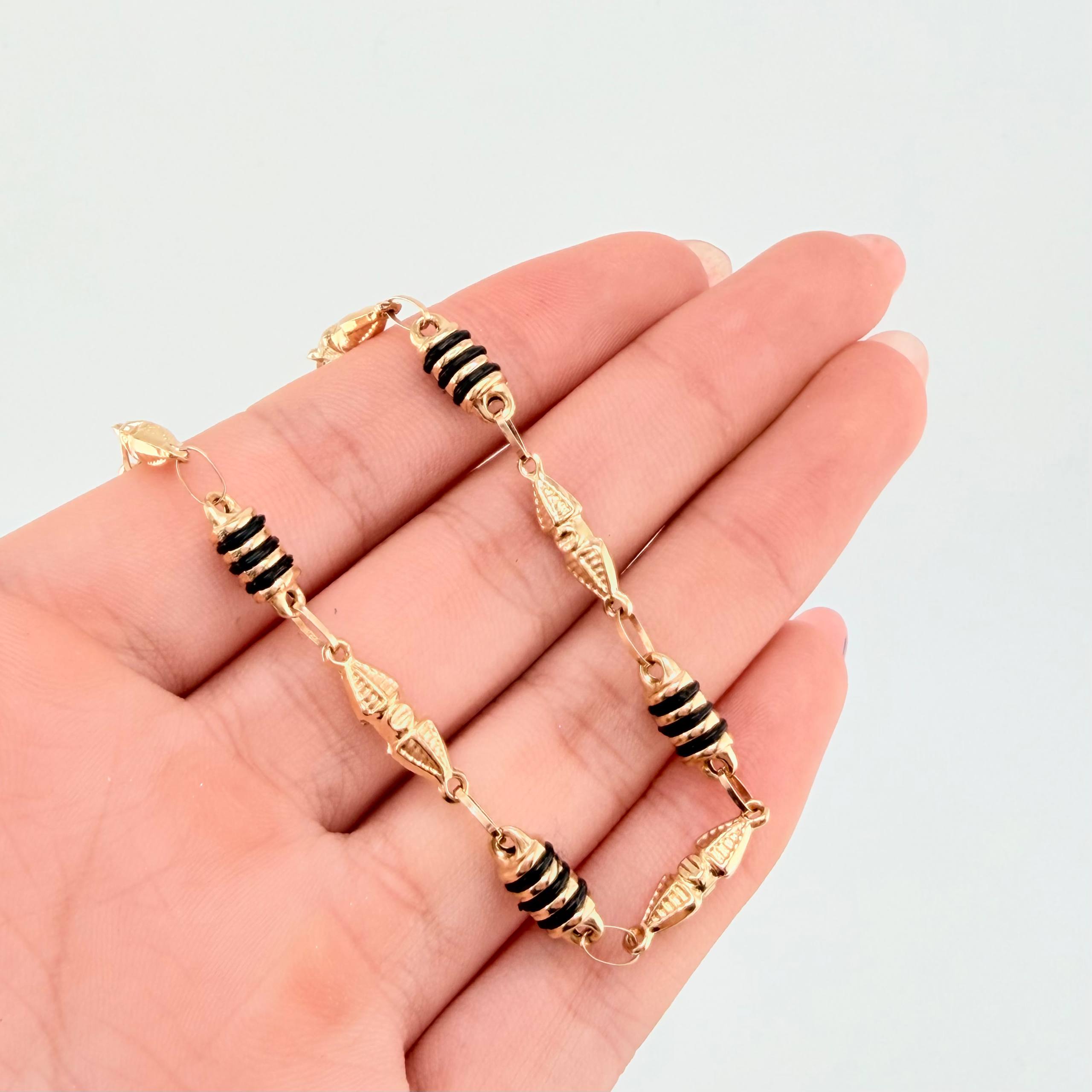 Pulso Rustico Dubai Barril Cauchos Negros 4.1gr / 7 3/4 in / 5mm Oro Amarillo 18K ©