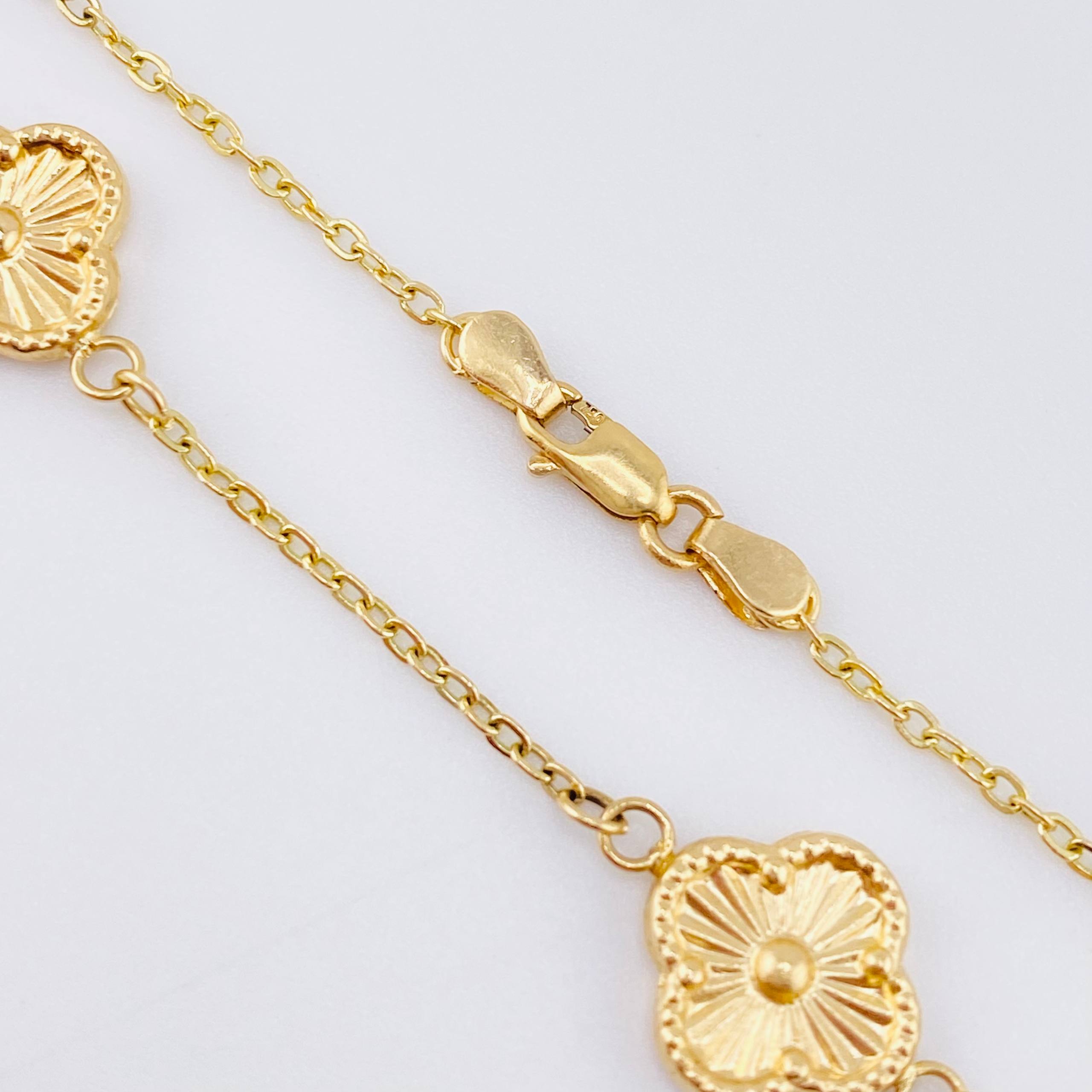 Pulso Aro seguido Treboles Flores Diamantadas 3.05gr / 7 1/4 in / 10mm Oro Amarillo Nac.Esp. 18K *