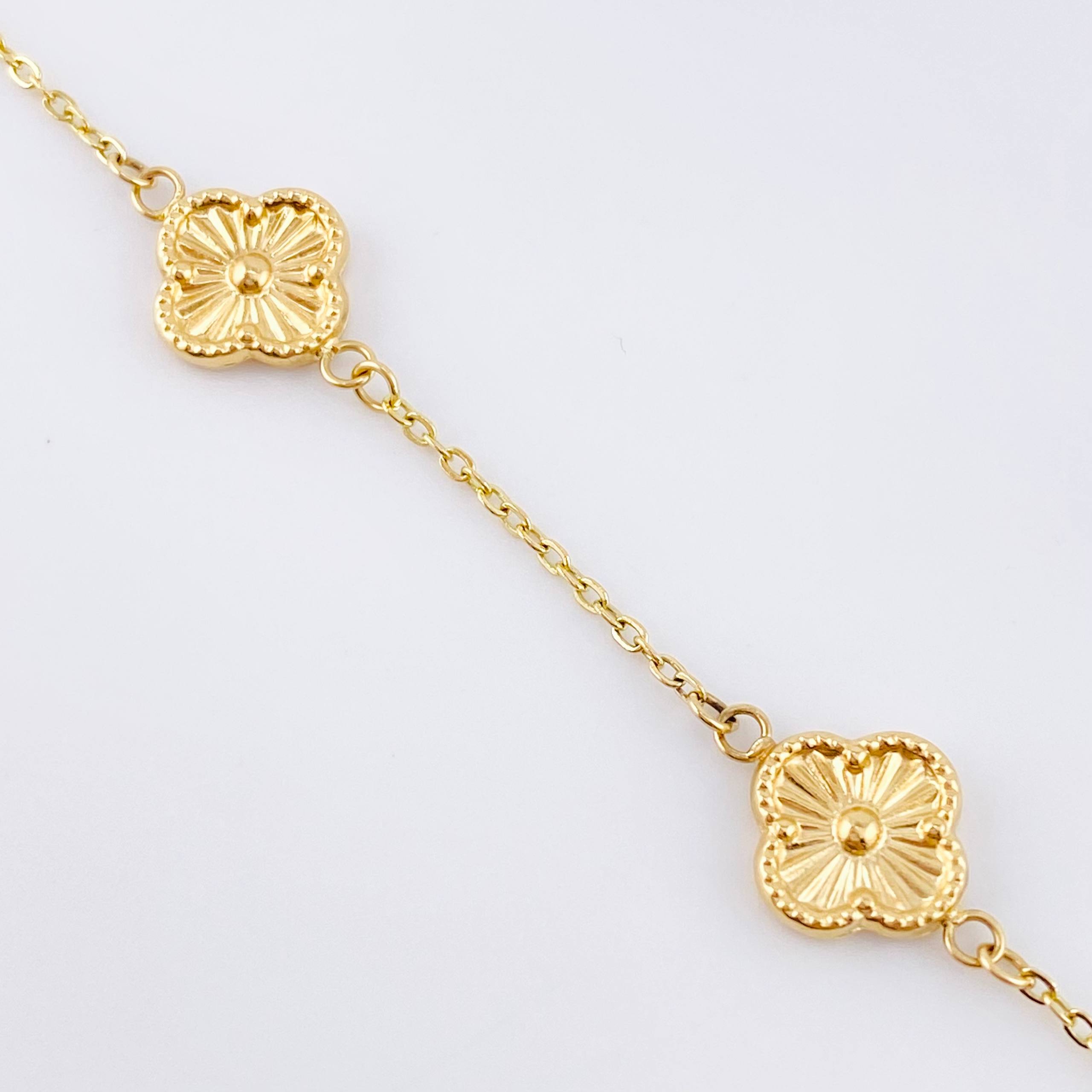 Pulso Aro seguido Treboles Flores Diamantadas 2.95gr / 7 1/2 in / 10mm Oro Amarillo Nac.Esp. 18K