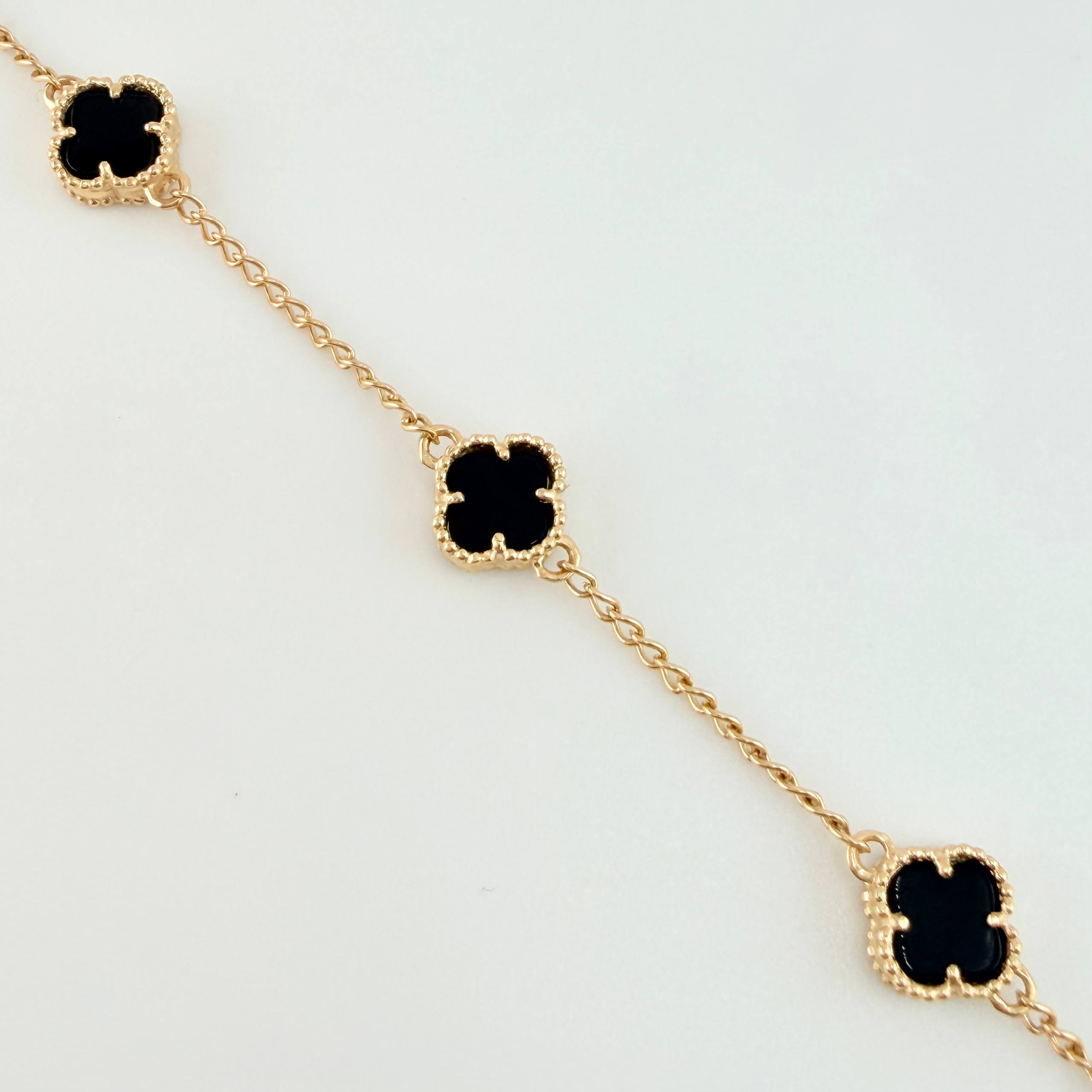 Pulso Espiga Trebol Onix Negro 4.55gr / 7 1/4 in / 7.6mm Oro Amarillo Nac.Esp. 18K *
