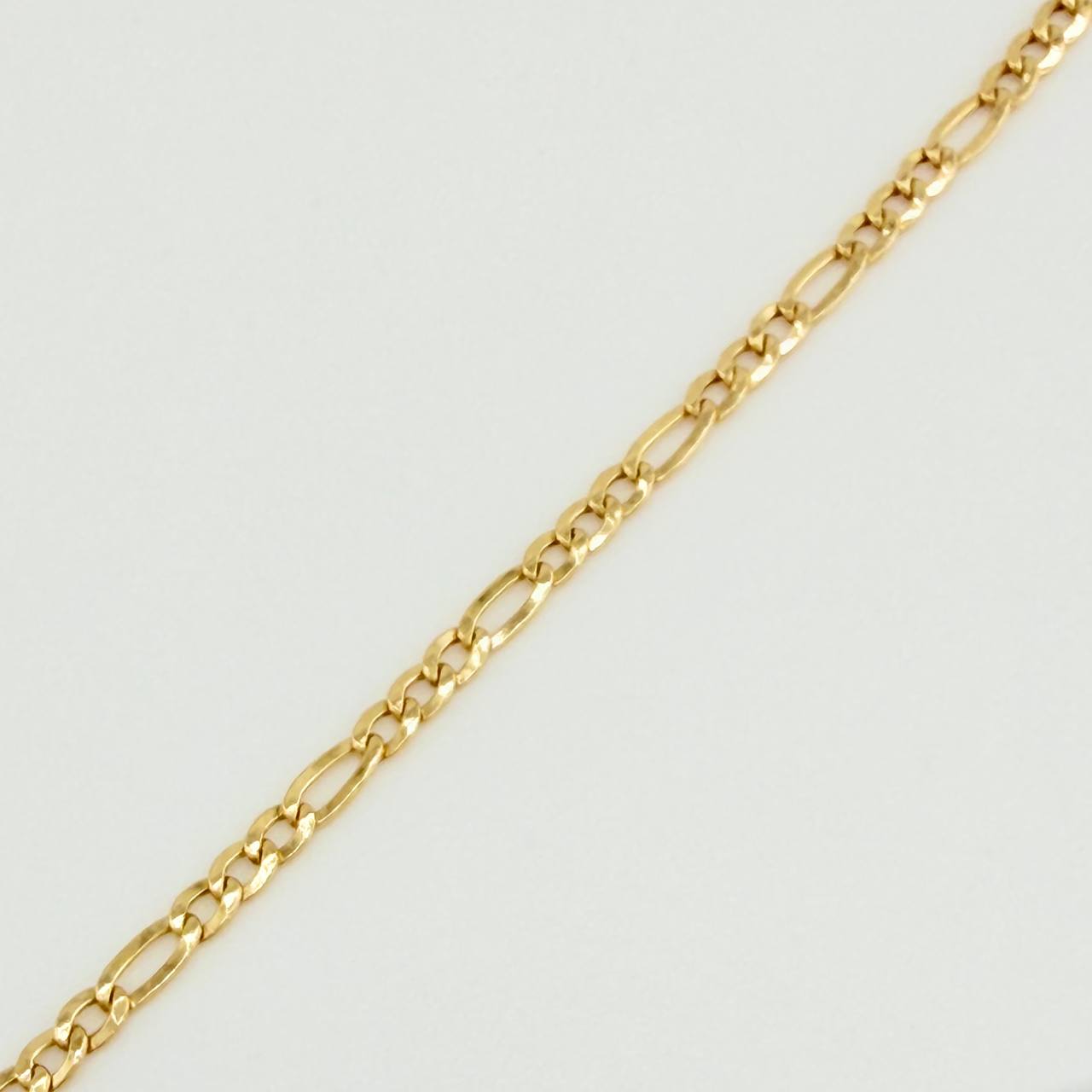 Pulso Figaro 1.4gr / 7 1/2 in / 2.2mm Oro Amarillo +1 18K $