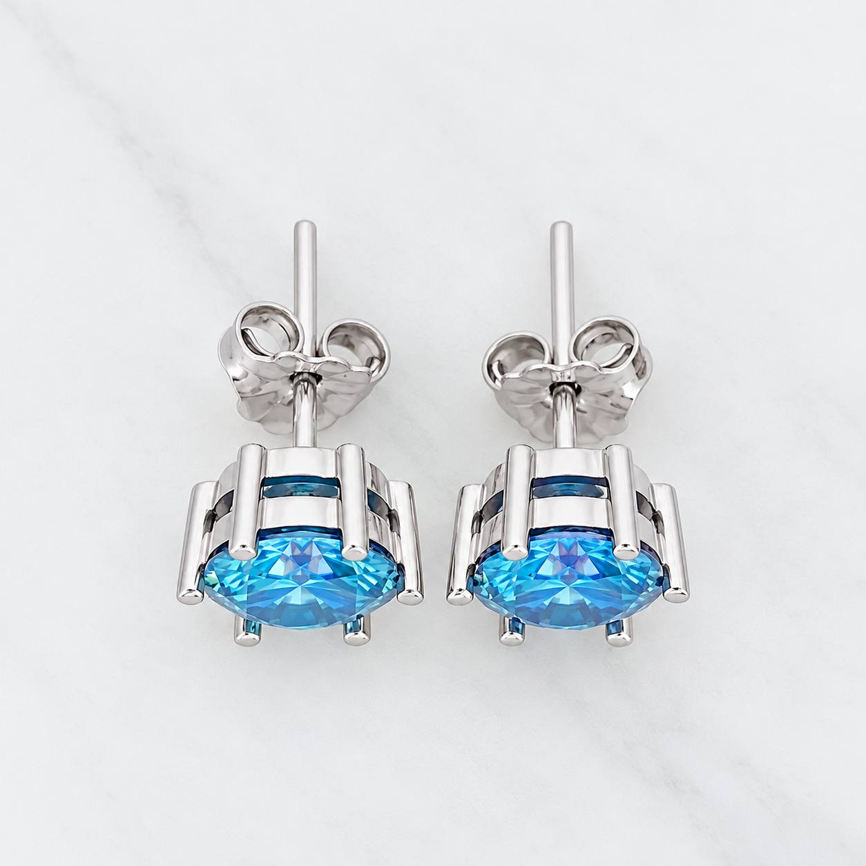 Topos Seis Garras Moisanita 1 Qts 2.15g / in / 7.16mm Oro Blanco 18K
