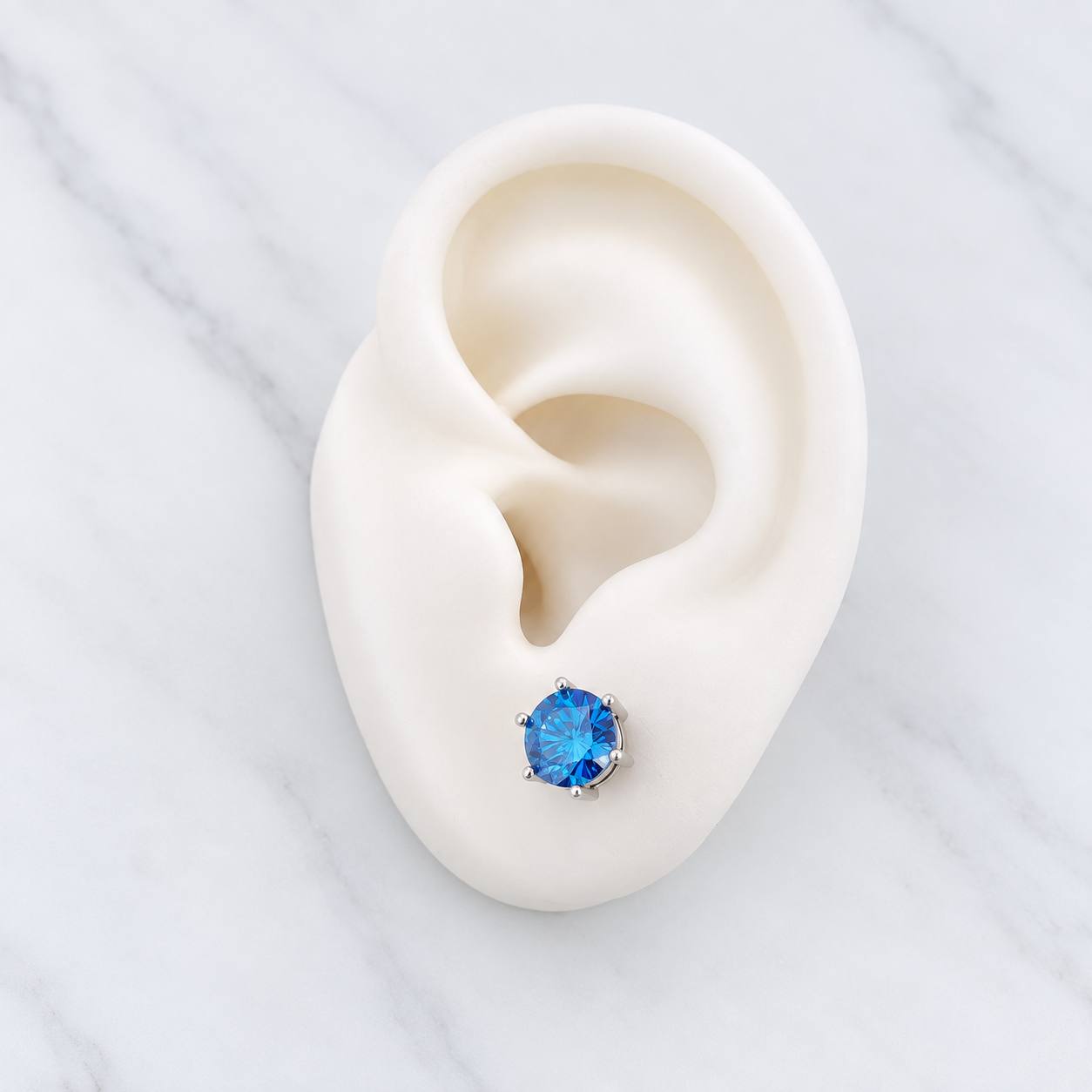 Topos Seis Garras Moisanita 1 Qts 2.15g / in / 7.16mm Oro Blanco 18K