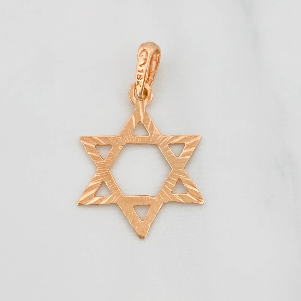 Dije Silueta Estrella 0.75g / 1 in Oro Rosa 18K