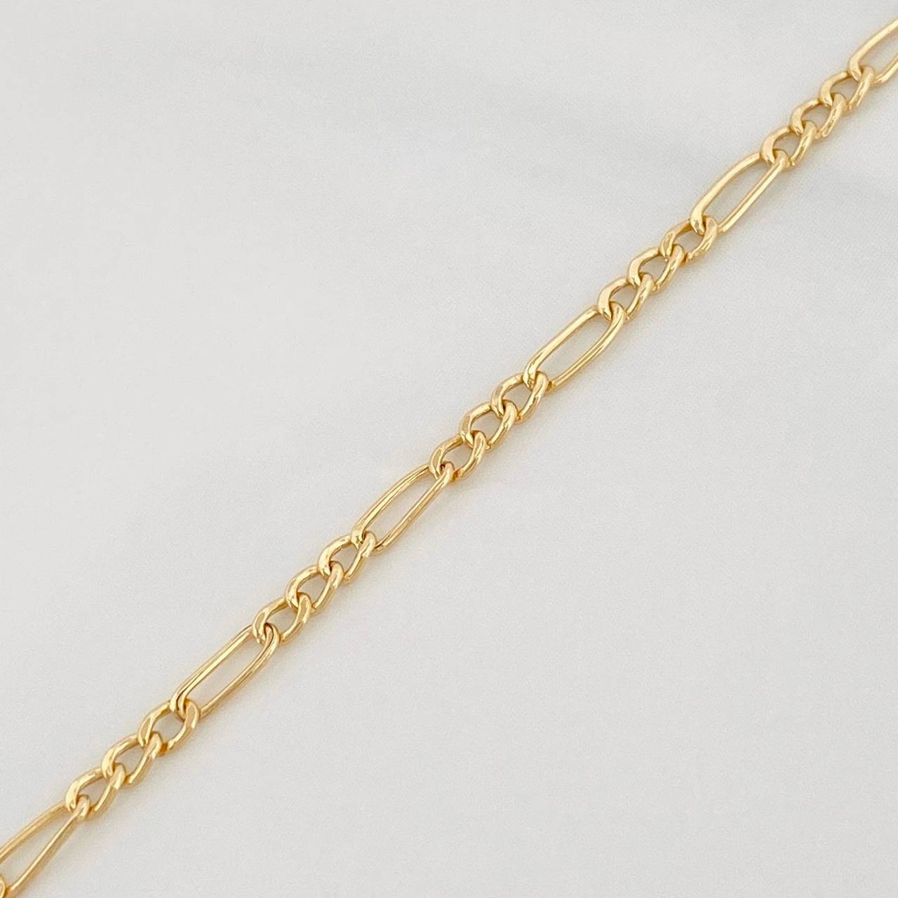 Figaro Bracelet 1.1g / 7 3/4 in / 2.19mm Yellow Gold 18K