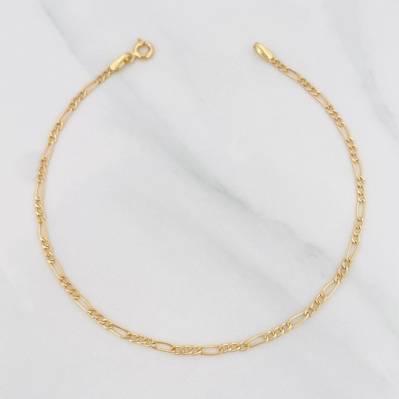 Figaro Bracelet 1.1g / 7 3/4 in / 2.19mm Yellow Gold 18K