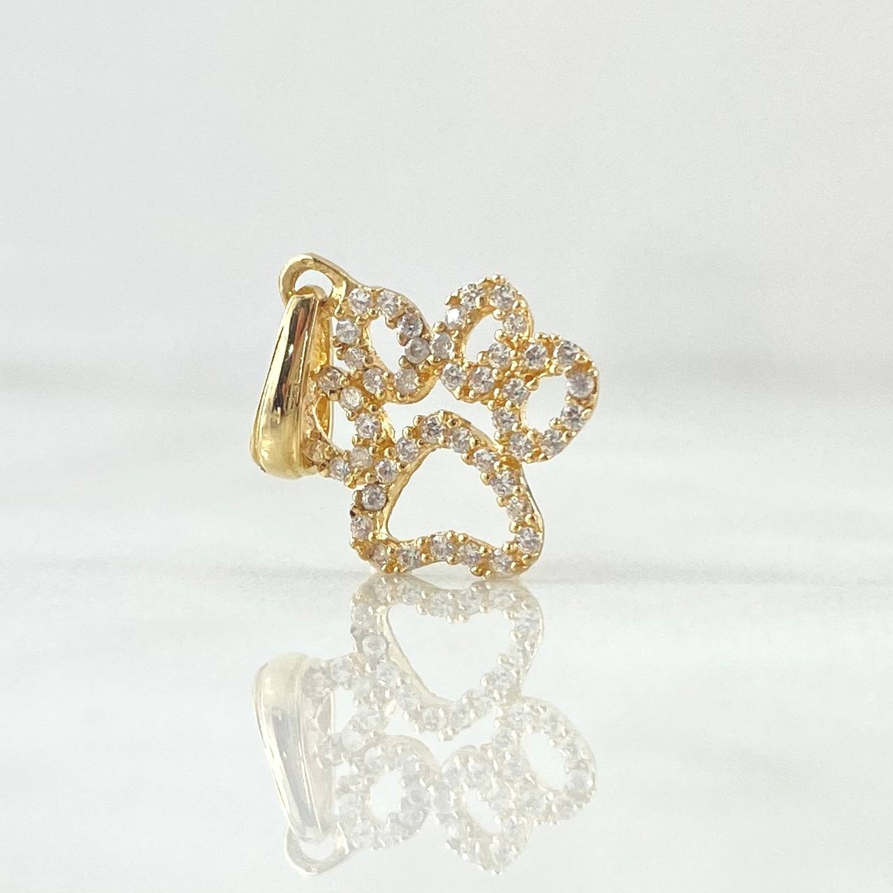 Dije Huella 0.9gr / 2cm / Circones Blancos Oro Amarillo 18K