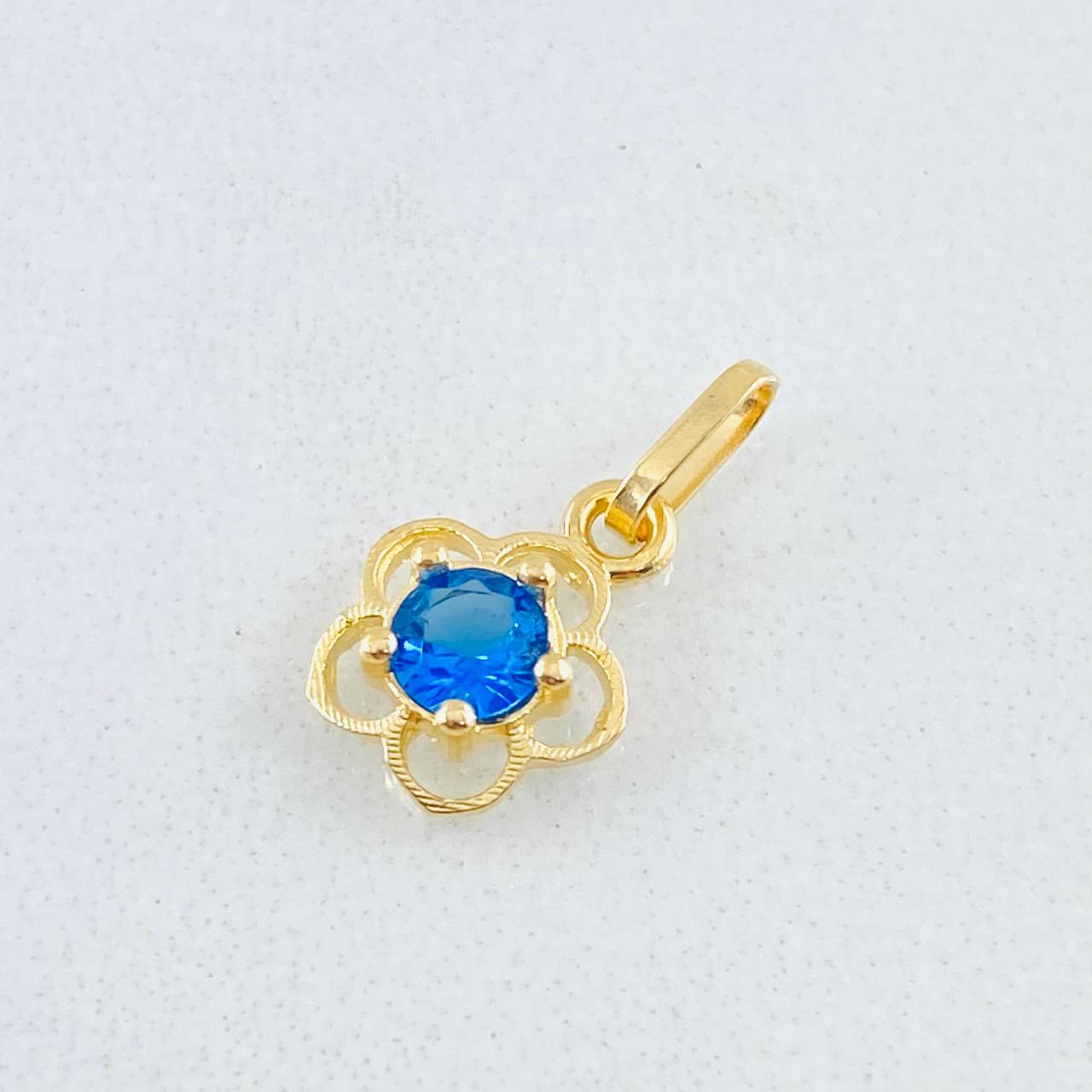 Dije Flor 0.4gr / 1/2 in / Oro Amarillo 18K