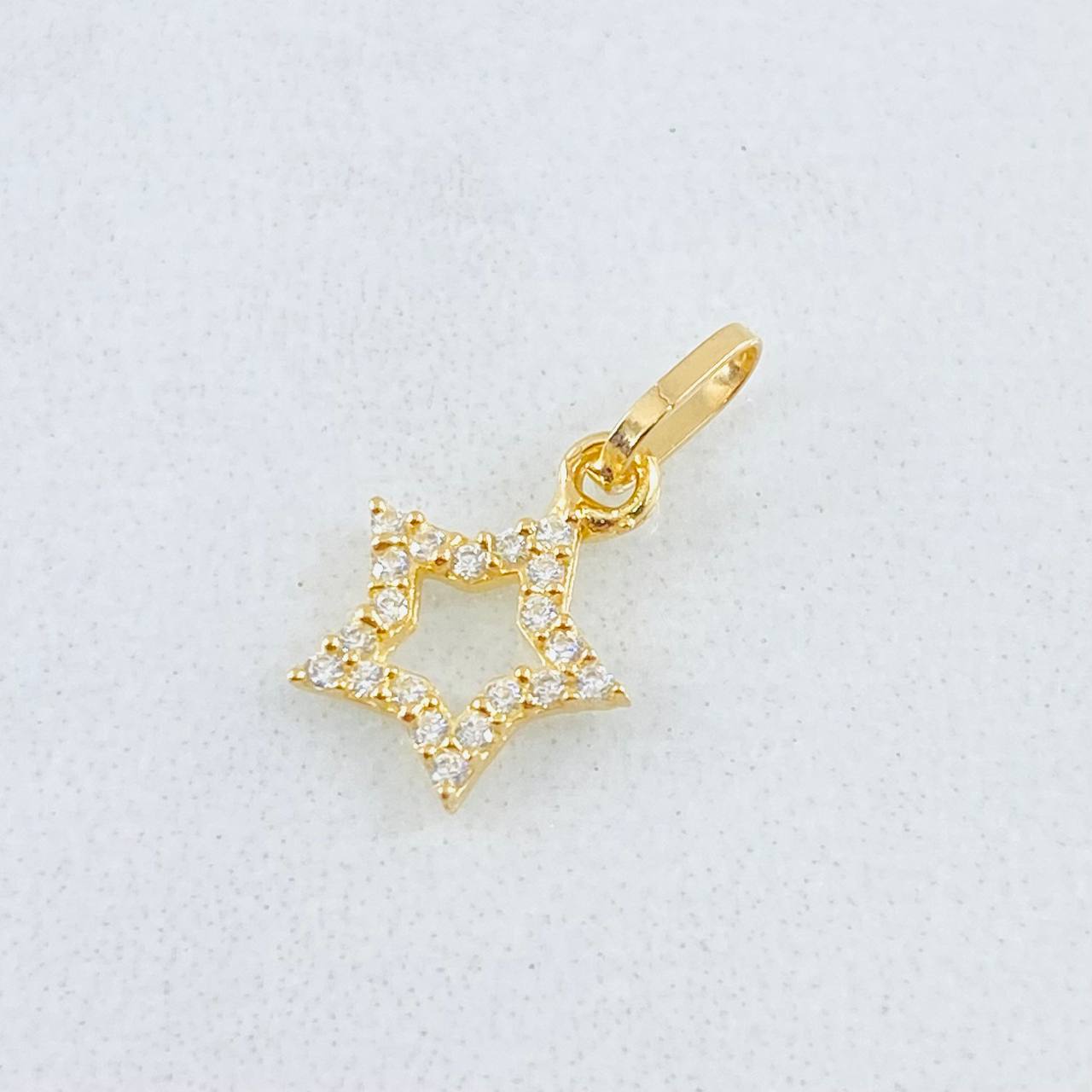 Dije Estrella 0.35gr / 1/2 in / Oro Amarillo 18K