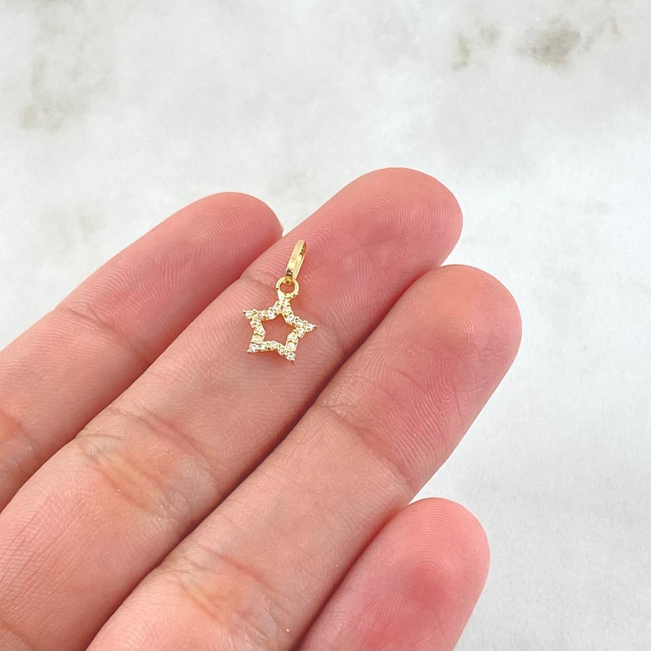 Dije Estrella 0.35gr / 1/2 in / Oro Amarillo 18K