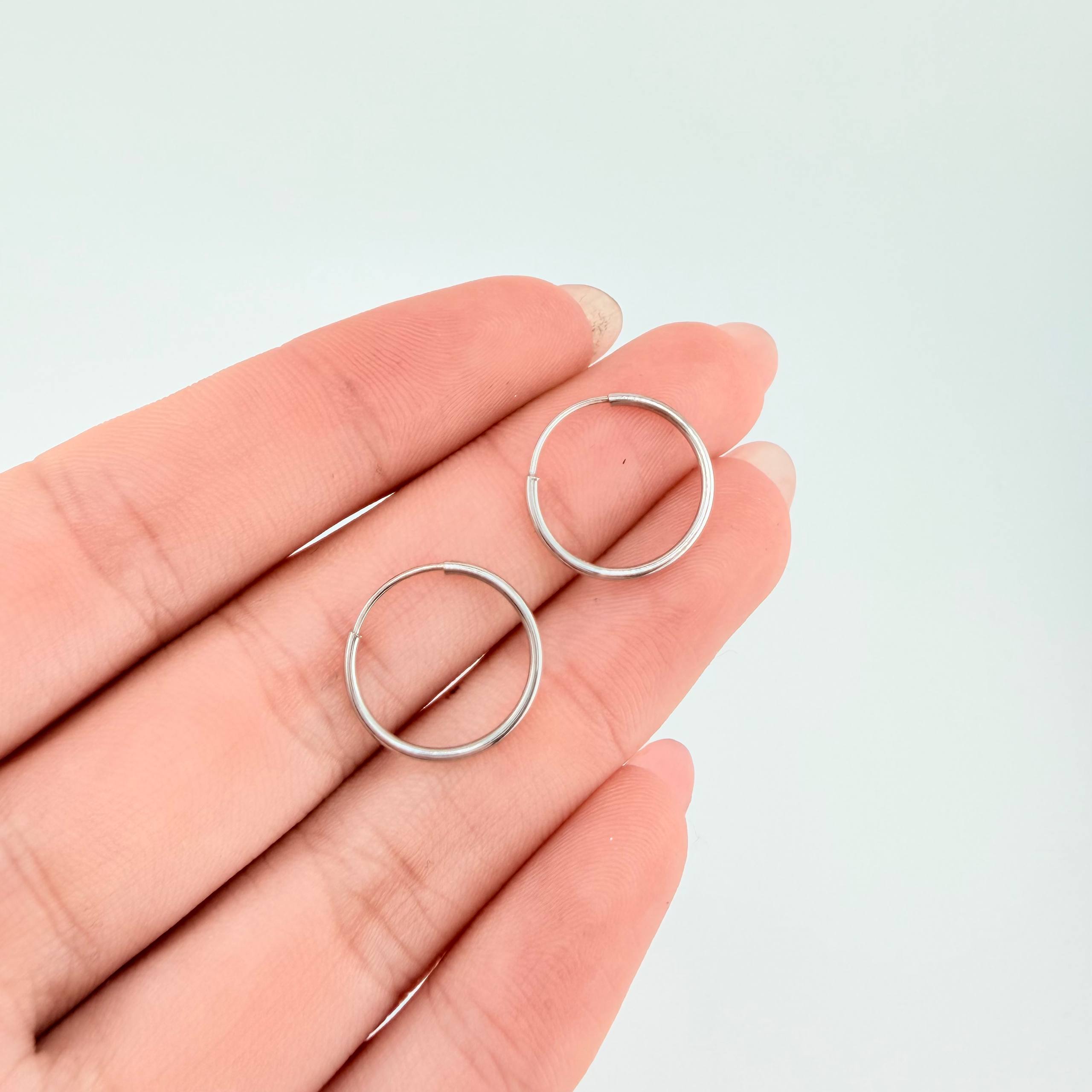 Candongas Aro Liso 0.6gr / 1/2 in / Oro Blanco 18K *
