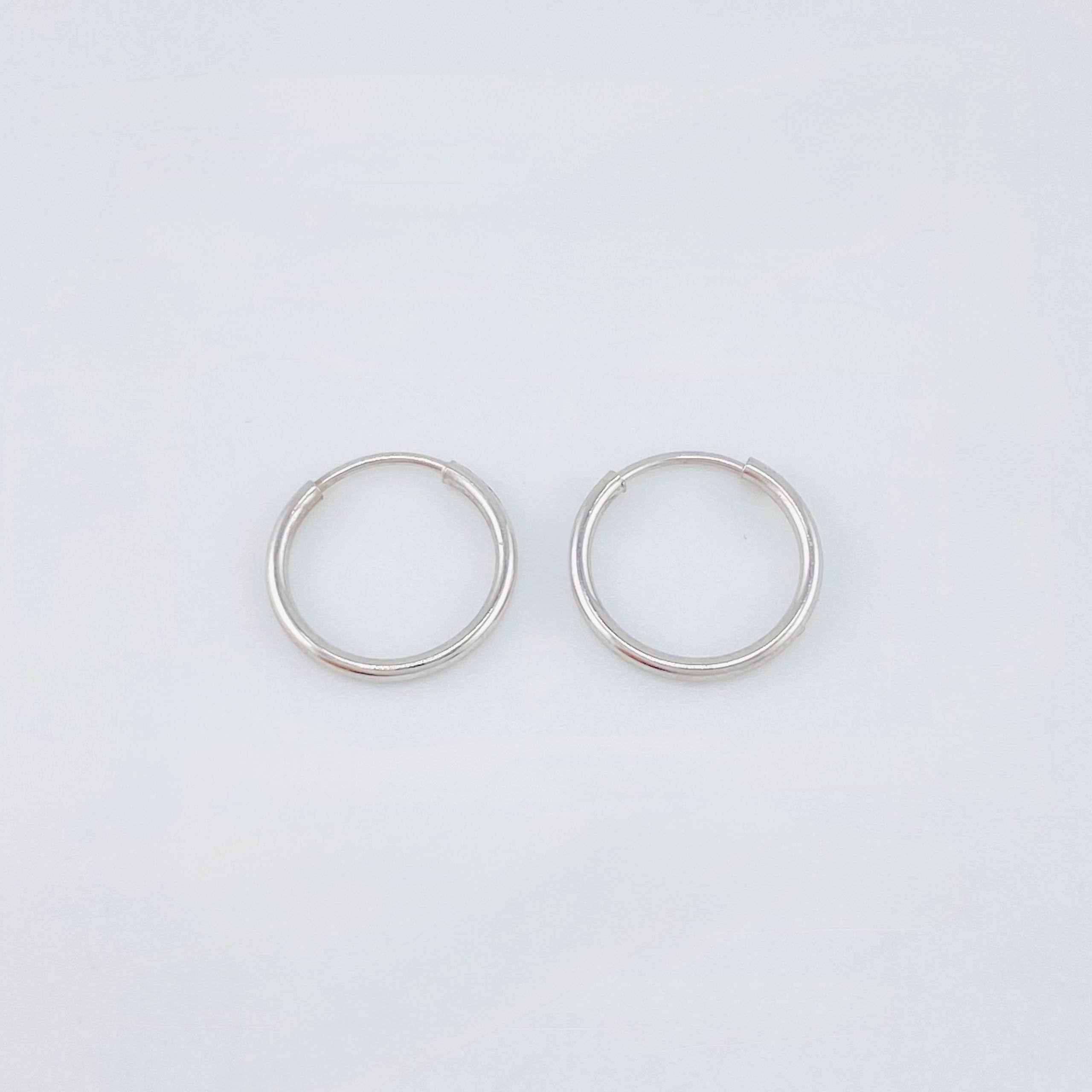 Candongas Aro Liso 0.4gr / 1/2 in / Oro Blanco 18K