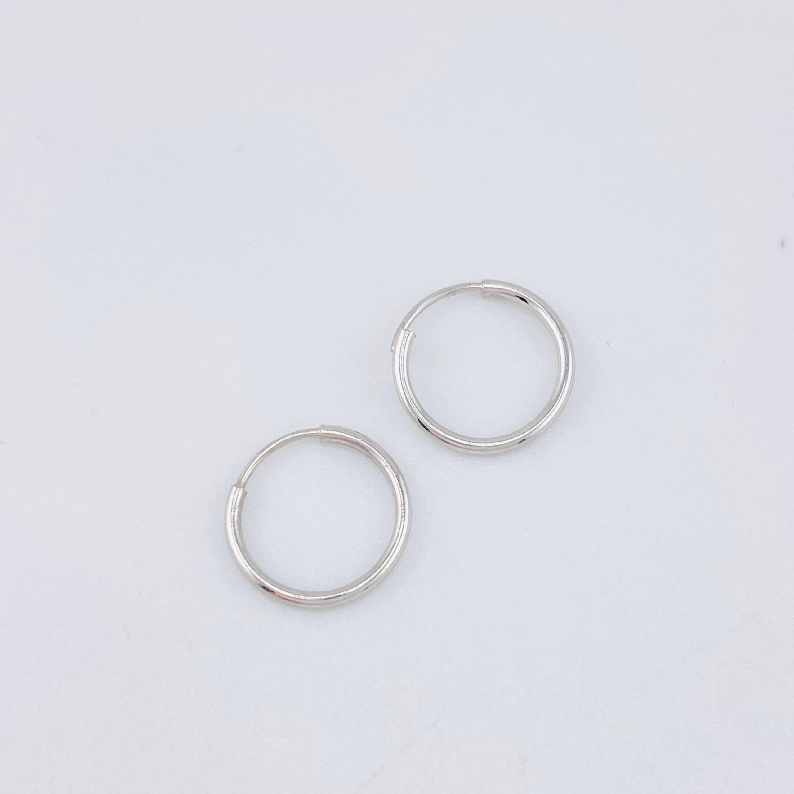 Candongas Aro Liso 0.4gr / 1/2 in / Oro Blanco 18K