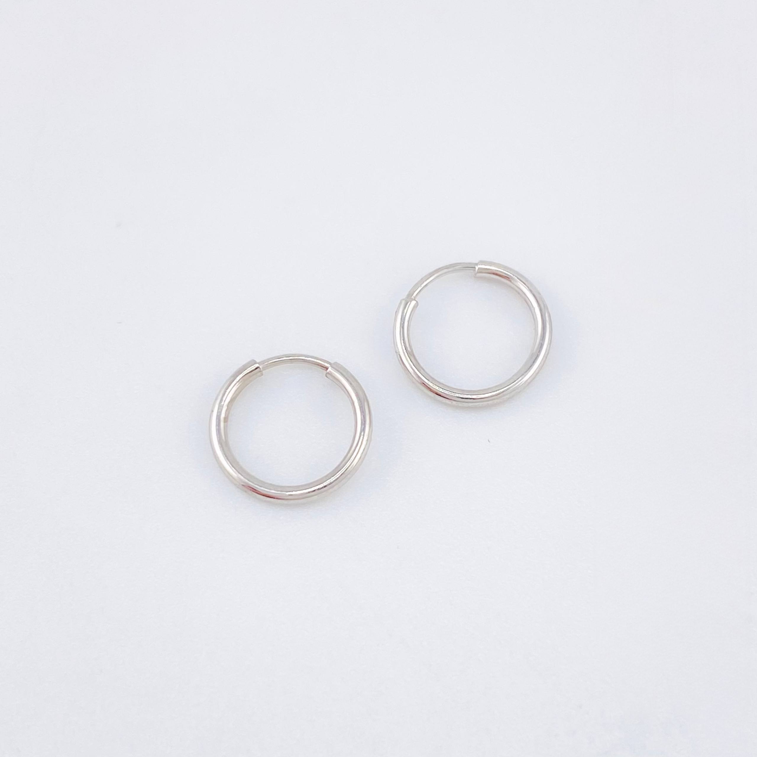 Candongas Aro Liso 0.35gr / 9mm Oro Blanco 18K *