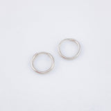 Candongas Mini Aro Liso 0.35gr / 9mm Oro Blanco 18K ©