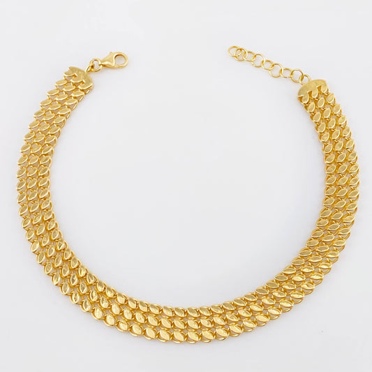 Pulso Hojas Triple Espiga 7.4gr / 7 3/4 in / 7.7mm Oro Amarillo +3 18K
