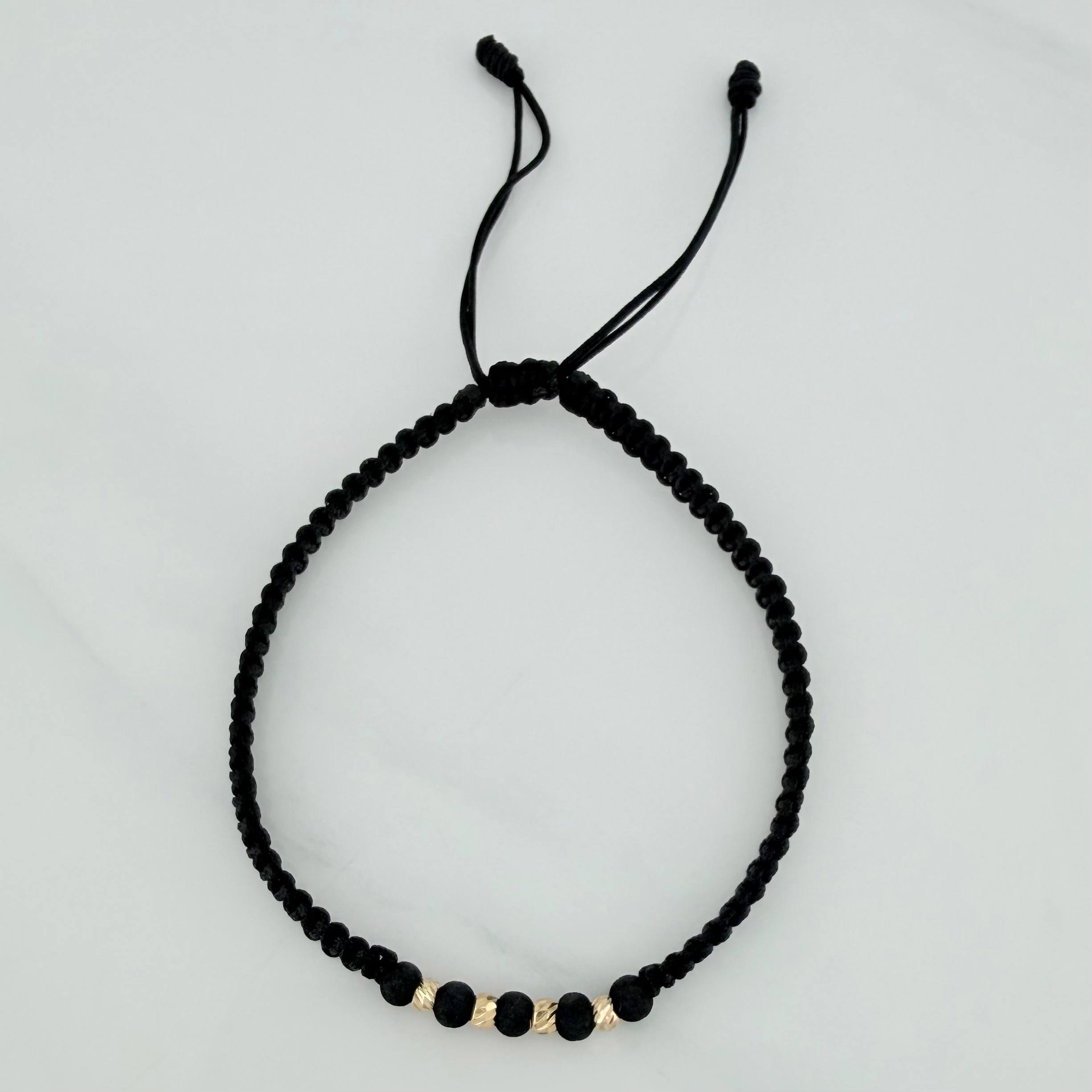 Pulsera Tejida Negra Bolas Diamantadas 3Mm Oro Amarillo 18K