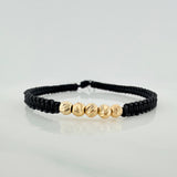 Pulsera Tejida Negra Bolas Diamantadas 4Mm Oro Amarillo 18K