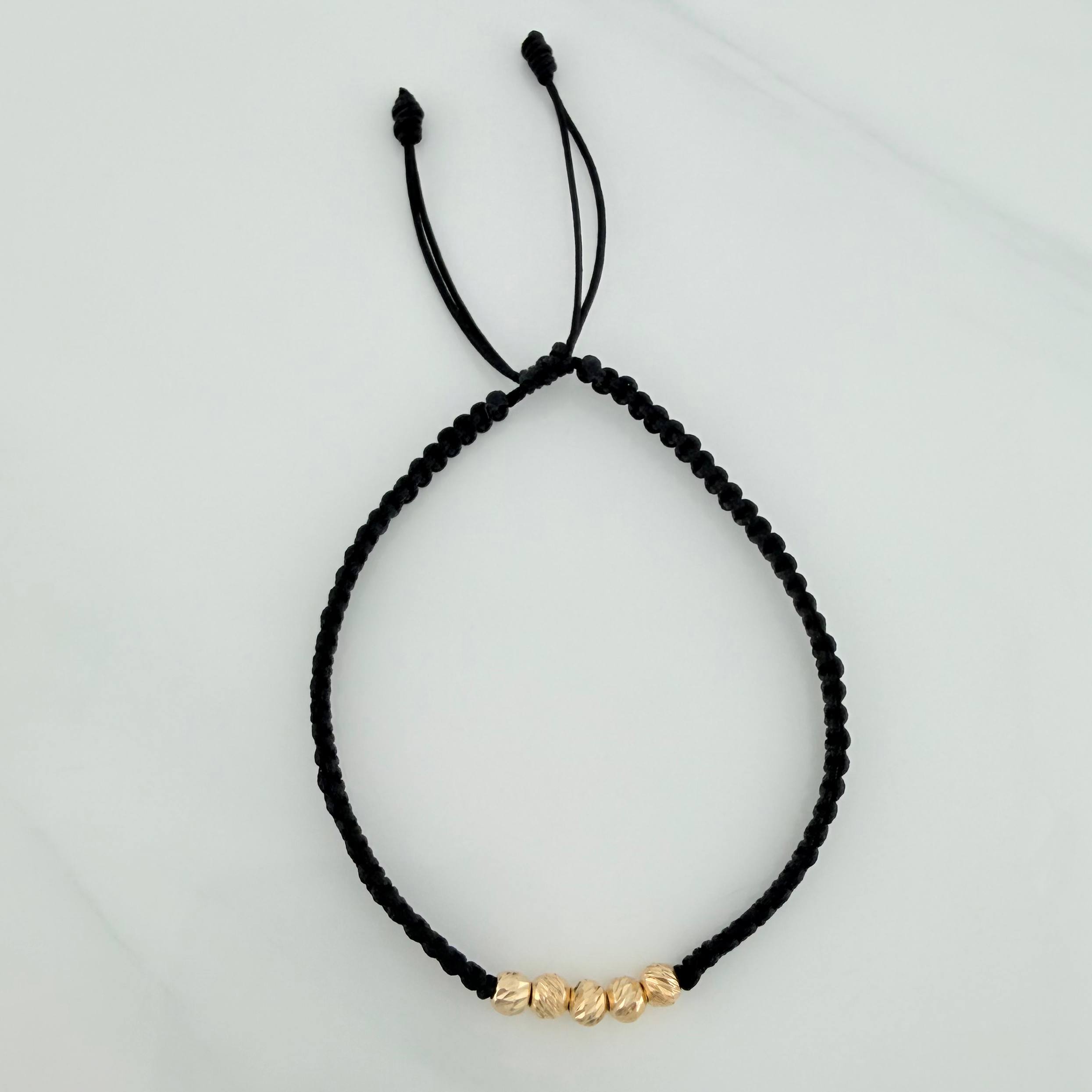 Pulsera Tejida Negra Bolas Diamantadas 4Mm Oro Amarillo 18K