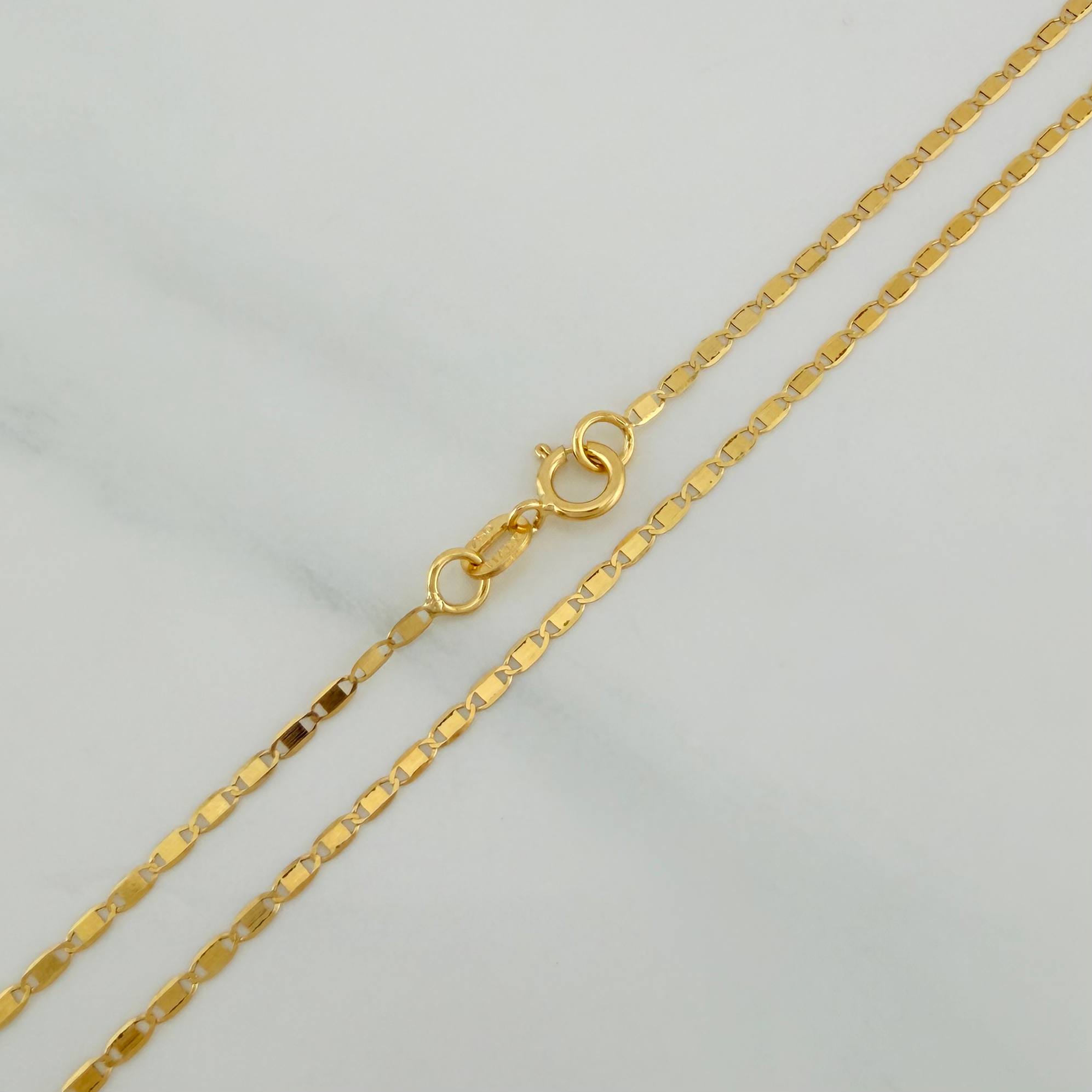Cadena Escalera Plana 1.35 g / 19 3/4 in / 1.41 mm Oro Amarillo 18K