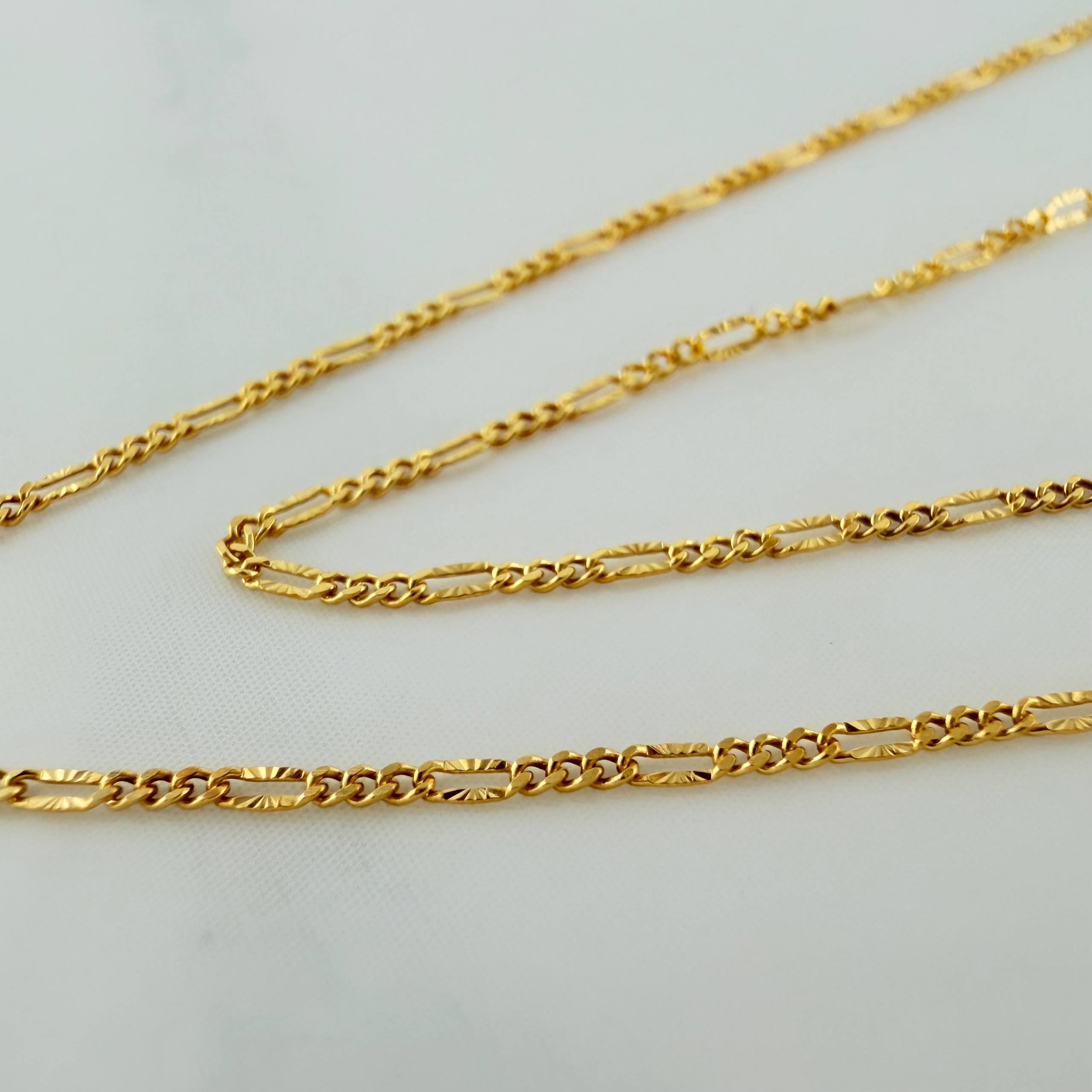 Cadena Figaro Diamantada 1.15 g / 17 3/4 in / 0.87 mm Oro Amarillo 18K