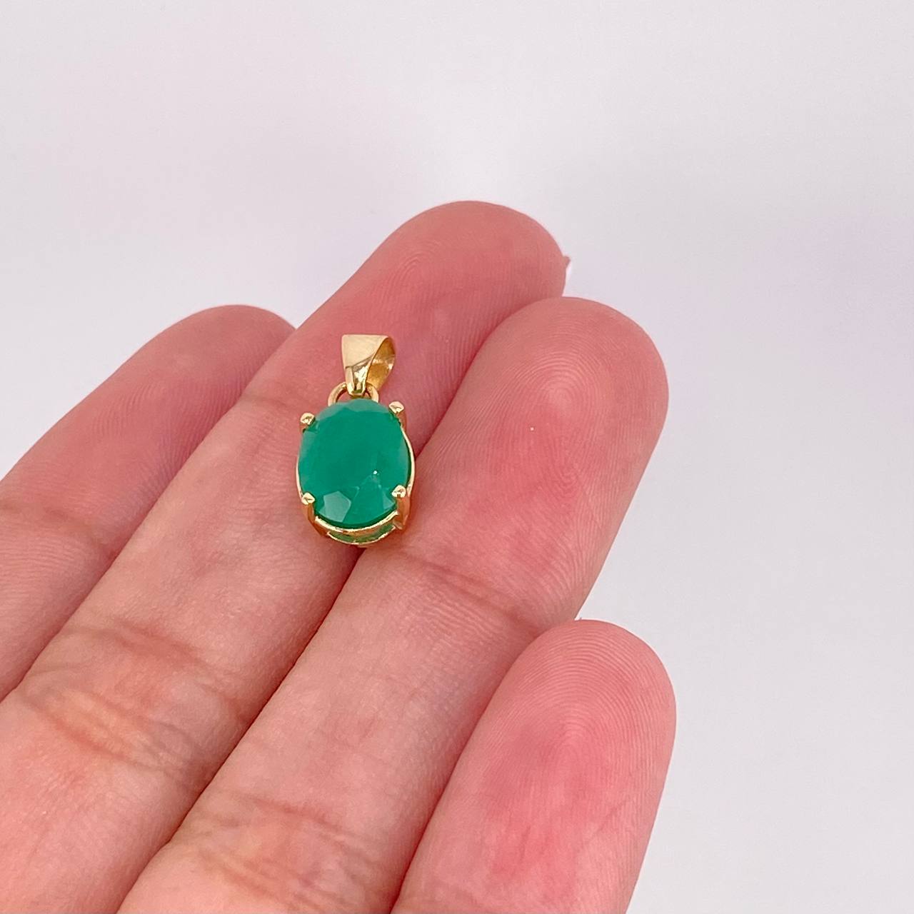 Dije Ovalo Esmeralda 1.5pts 1.4g / 1/2 in Oro Amarillo 18K