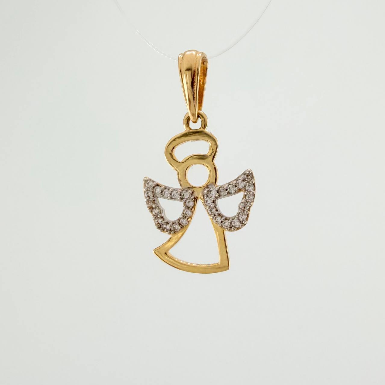 Dije Angel 1.65gr / 1 in / Dos Oros Amarillo Blanco 18K %