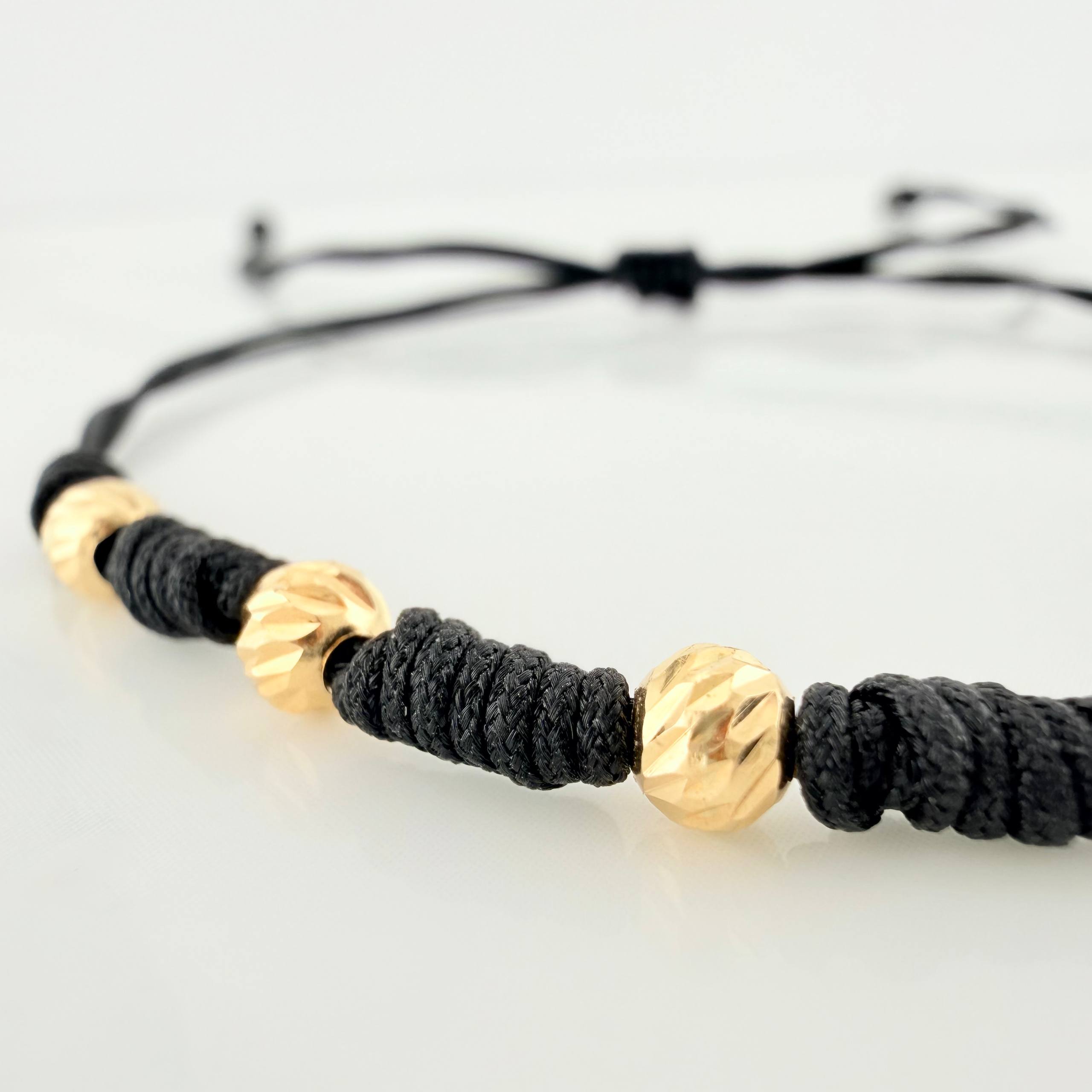 Black Woven Bracelet Yellow Gold 18K Diamond Cut Beads