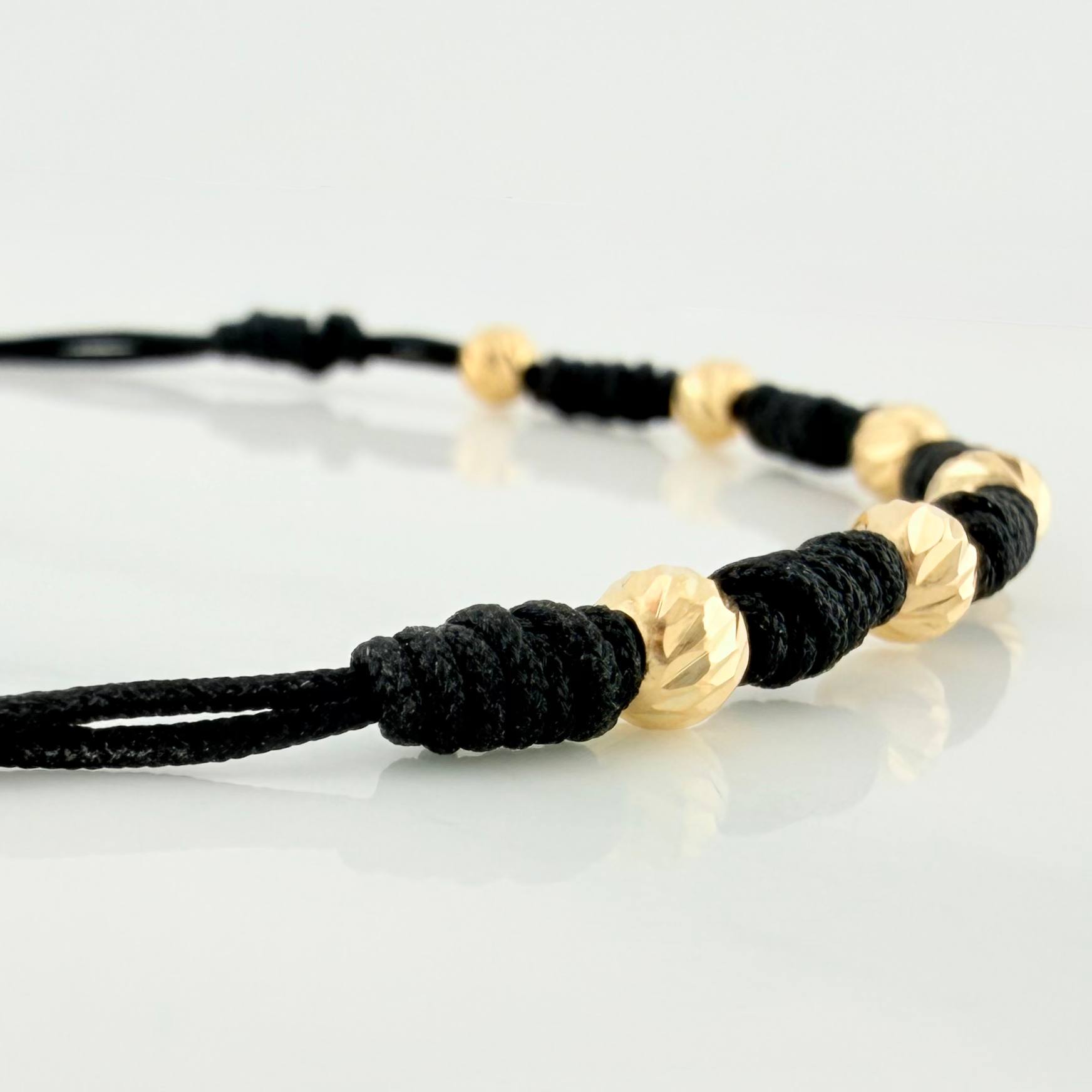 Black Woven Bracelet Yellow Gold 18K Diamond Cut Beads