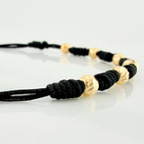 Black Woven Bracelet Yellow Gold 18K Diamond Cut Beads