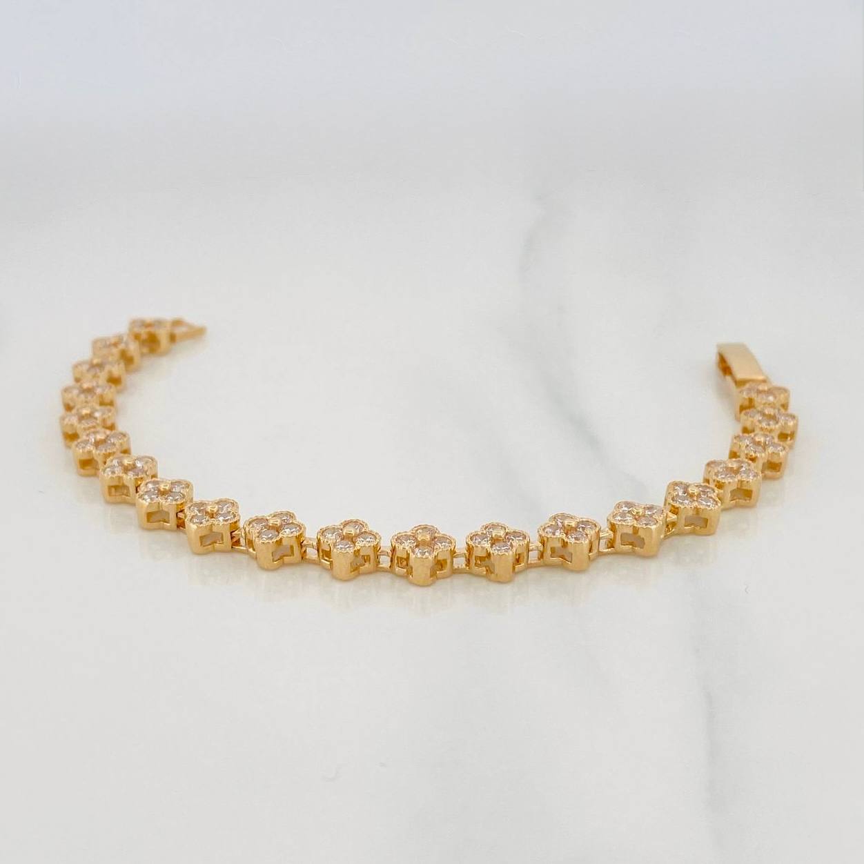 Pulso Flores 11.2g / 6 1/4 in / 6mm Oro Amarillo 18K