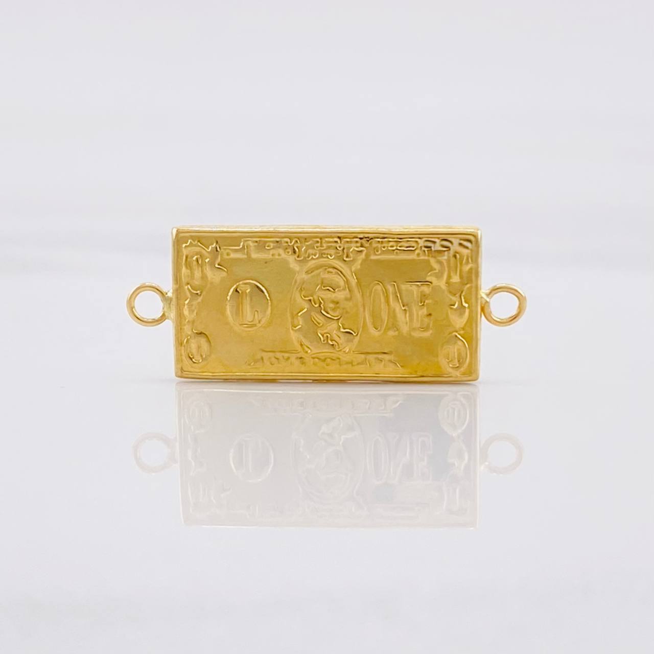 Herraje Dólar 0.9g / 1 in Oro Amarillo 18K
