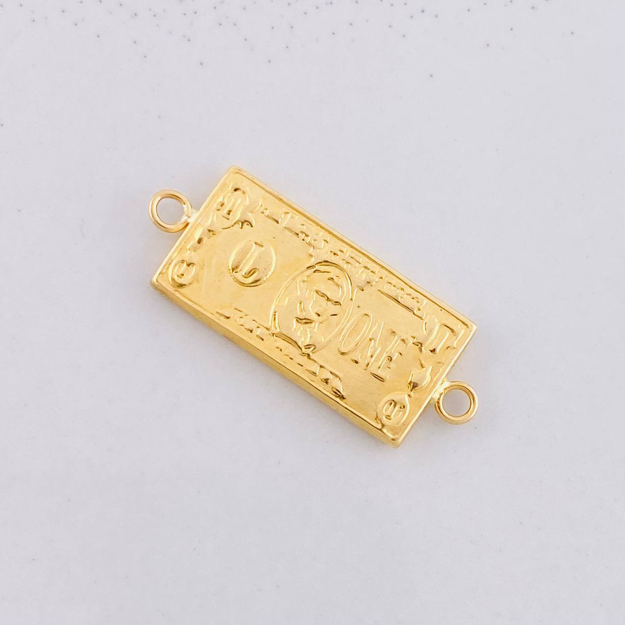 Herraje Dólar 0.9g / 1 in Oro Amarillo 18K