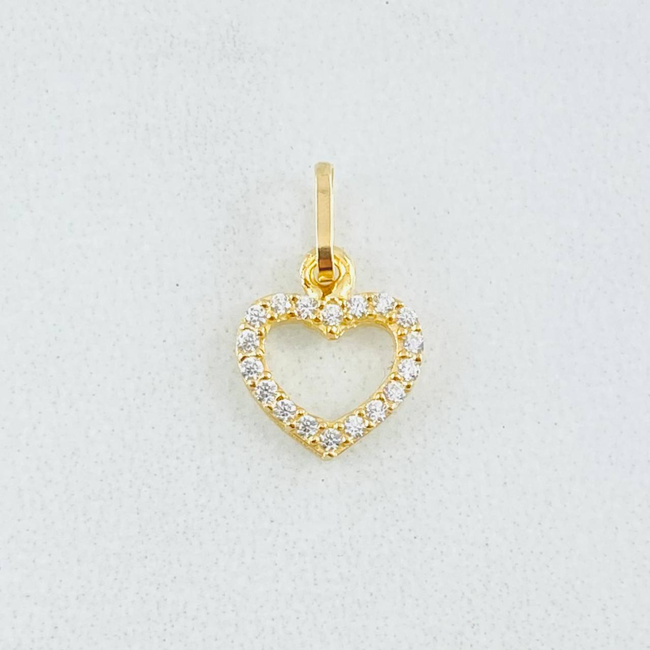 Dije Silueta Corazón Tupido 0.4gr / 1/2 in / Oro Amarillo 18K